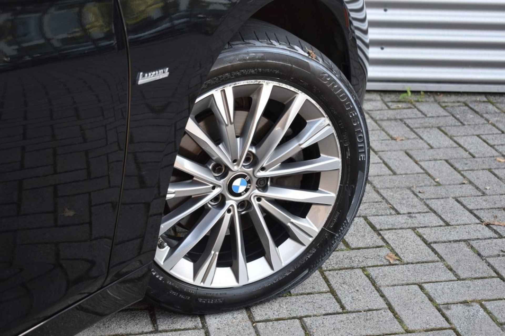 BMW 2-serie Active Tourer 218I CENT.HIGH EX. / LEDER / P.DAK / HEAD-UP / AFN. HAAK - 4/52