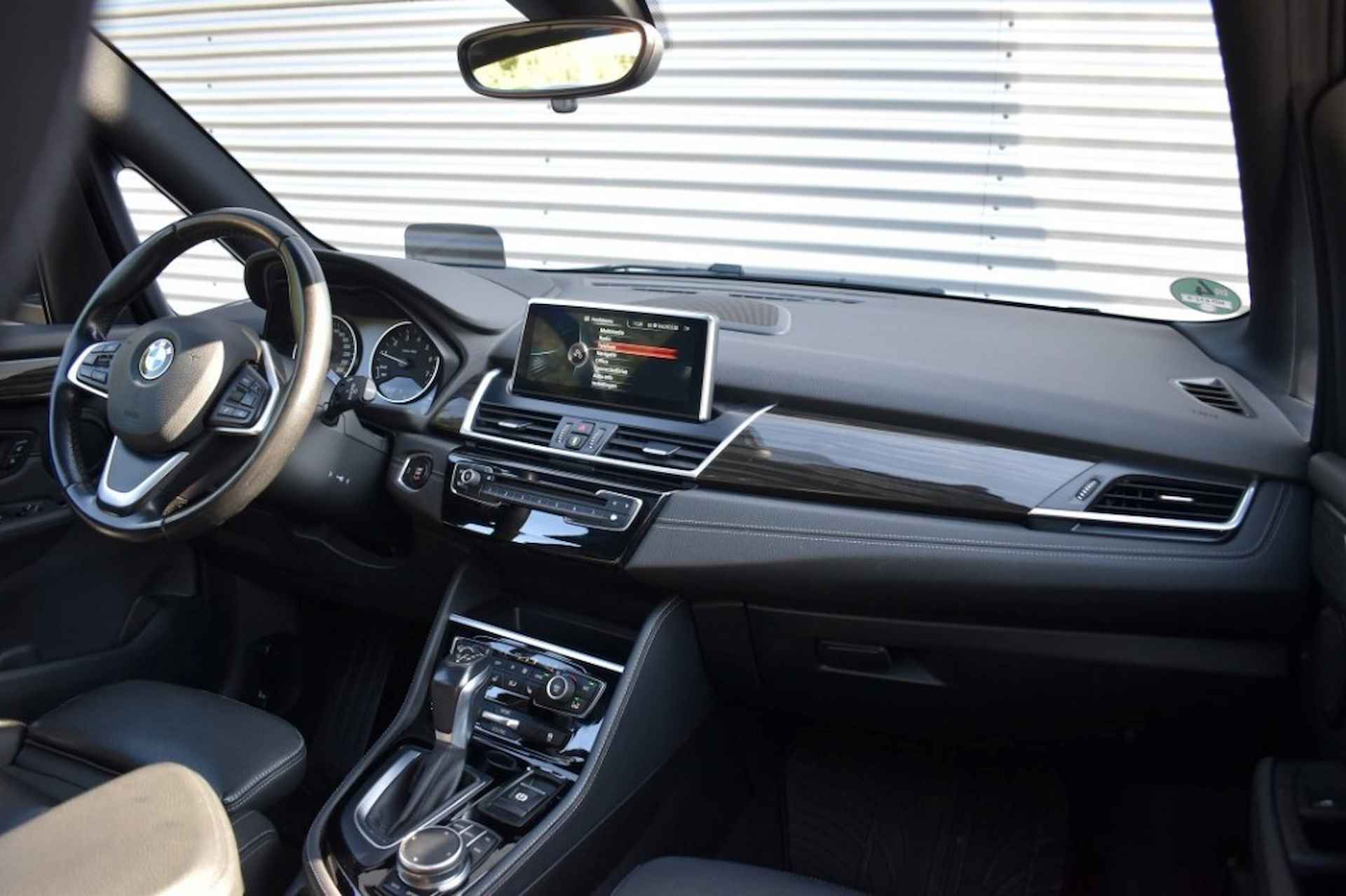 BMW 2-serie Active Tourer 218I CENT.HIGH EX. / LEDER / P.DAK / HEAD-UP / AFN. HAAK - 48/52