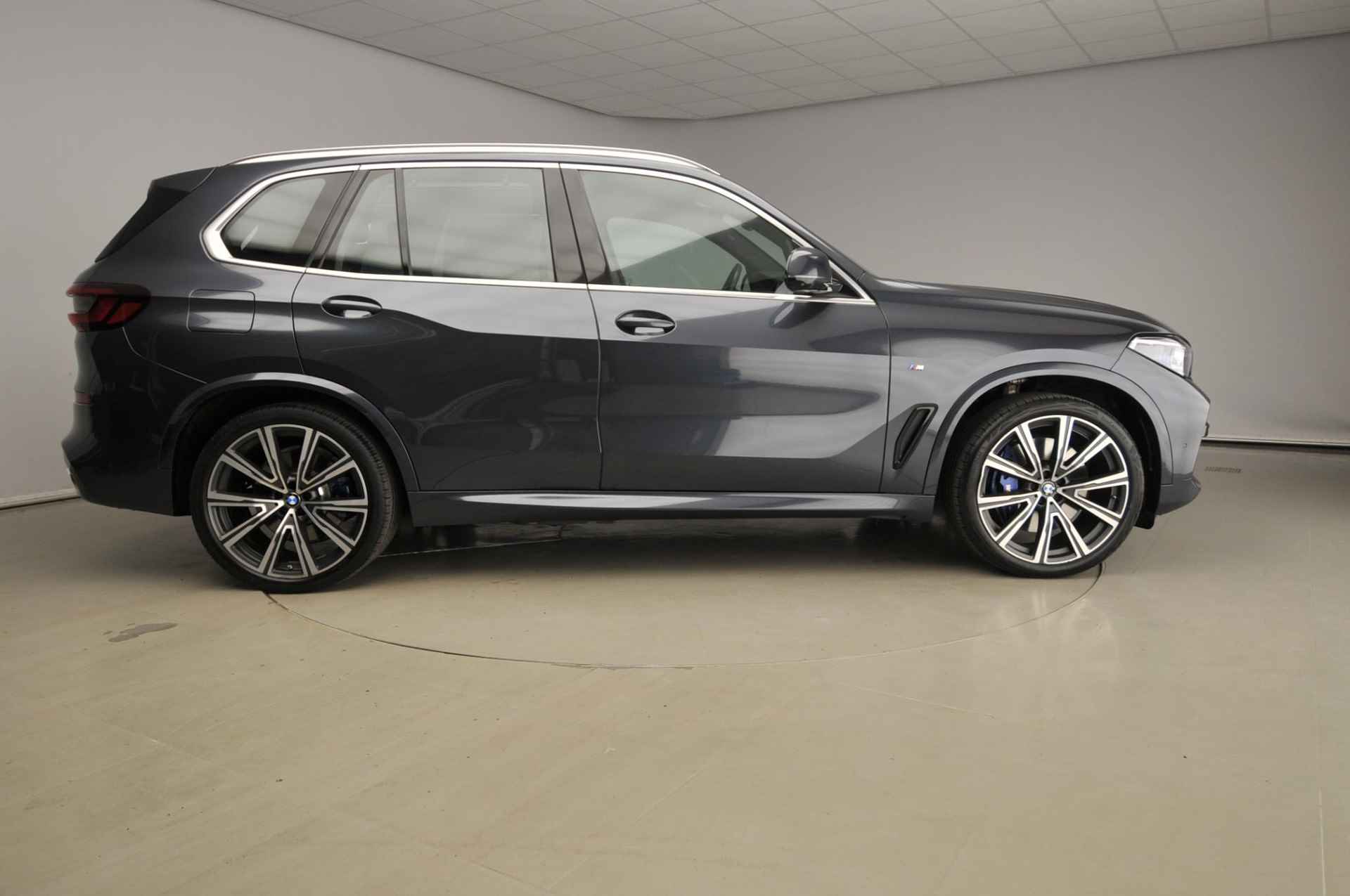 BMW X5 xDrive45e | M-Sportpakket | Laserlicht | Leder | HUD | Comfortzetels | Active steering | Chrome line | DAB | Harman-kardon sound | Alu 22 inch - 5/57