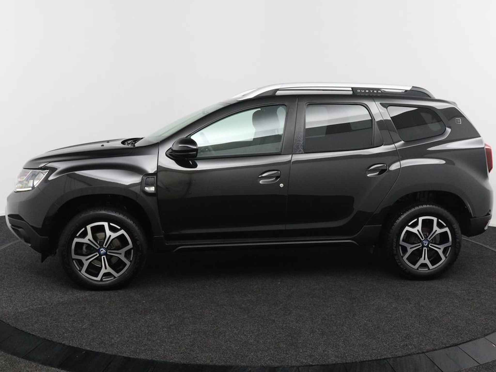 Dacia Duster 1.3TCe 130PK Serie Limitee 15th Anniversary | Trekhaak | Camera | Climate Control | Origineel Nederlands | Navigatie | Lichtmetalen Velgen | Cruise Control | - 3/46