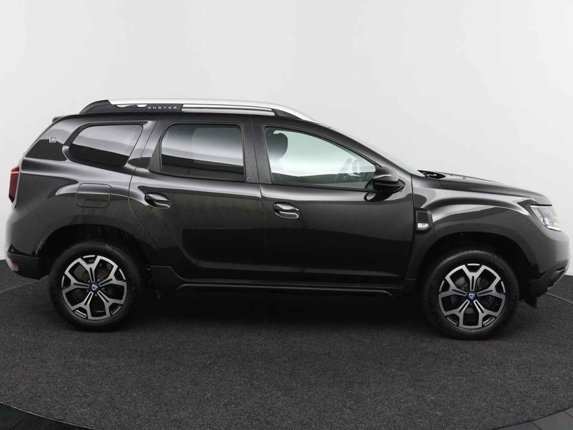 Dacia Duster 1.3TCe 130PK Serie Limitee 15th Anniversary | Trekhaak | Camera | Climate Control | Origineel Nederlands | Navigatie | Lichtmetalen Velgen | Cruise Control | - 8/46