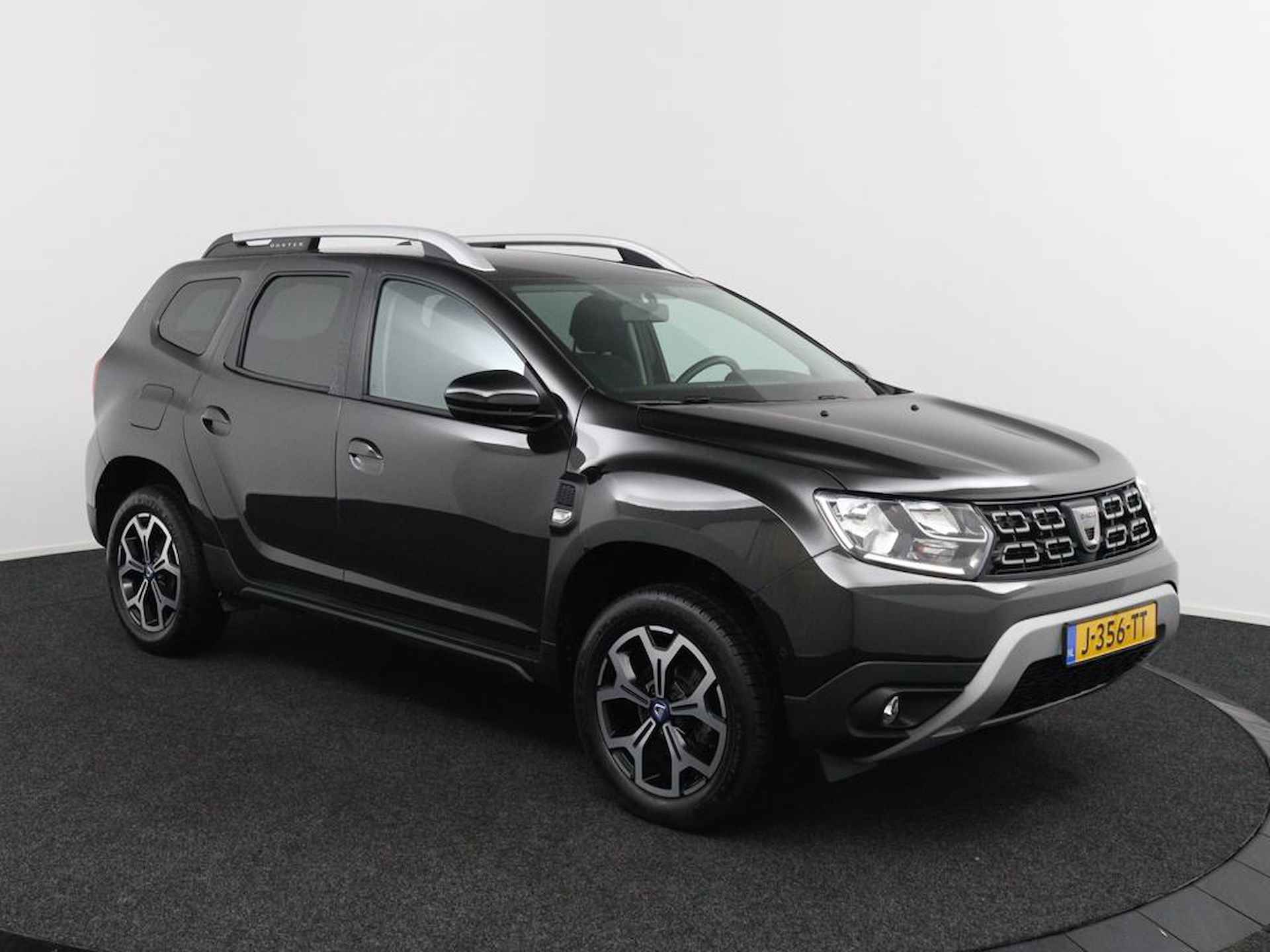 Dacia Duster 1.3TCe 130PK Serie Limitee 15th Anniversary | Trekhaak | Camera | Climate Control | Origineel Nederlands | Navigatie | Lichtmetalen Velgen | Cruise Control | - 9/46