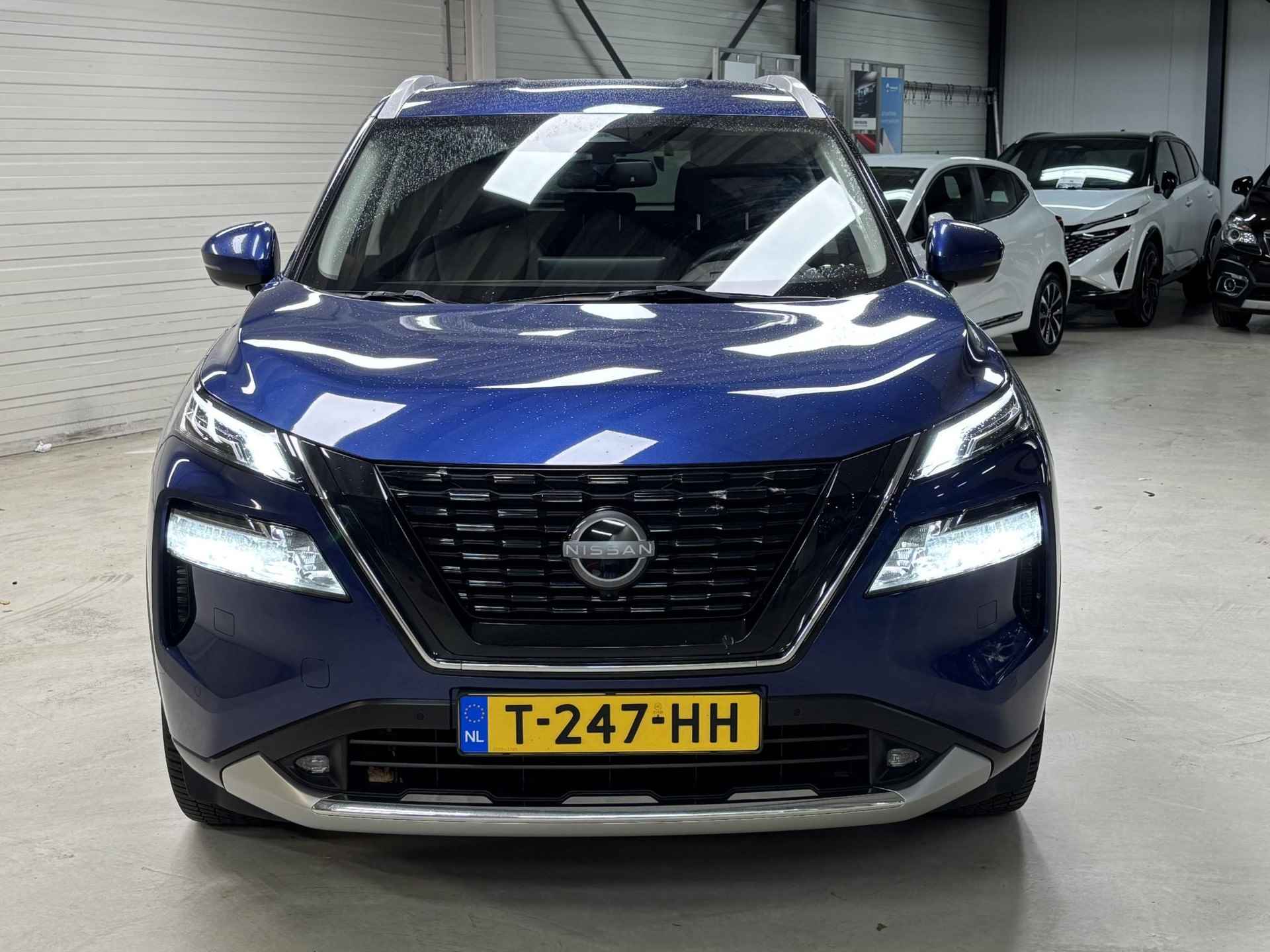 Nissan X-Trail 1.5 e-4orce Tekna 4WD 7p. AUTOMAAT / Trekhaak / Voorstoelen, stuurwiel en voorruit verwarmd / Rondomzicht camera / Parkeersensoren voor + achter / Navigatiesysteem full map / Lichtmetalen velgen 19" / Automatische airco / Apple Car Play & Android Auto / Metaalkleur - 16/41