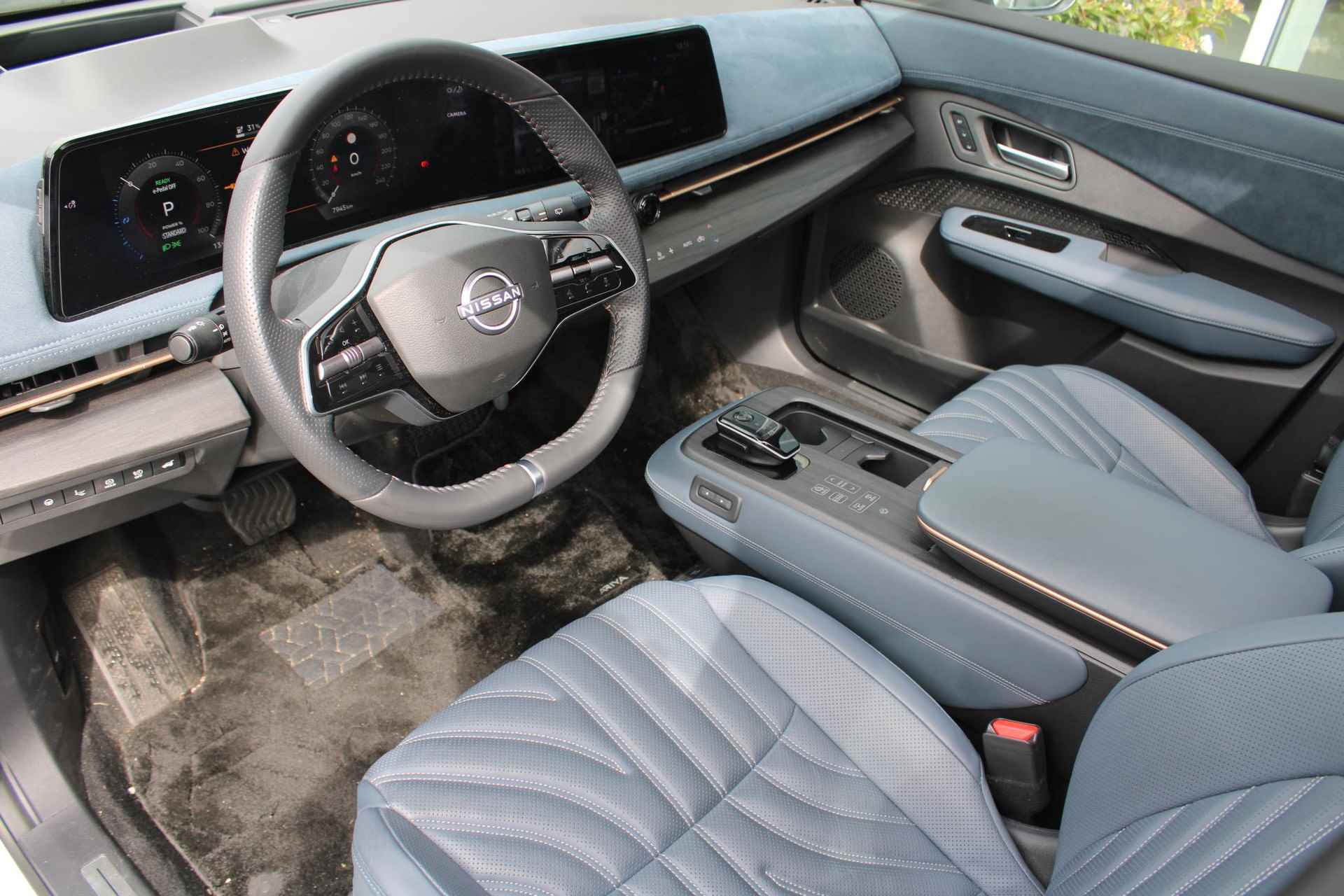 Nissan Ariya e-4ORCE Evolve 91 kWh 306PK AUTOMAAT | Schuif/Kantel dak | 360-Camera | Parkeersensoren | Adaptive cruise control | Stoelwarwarming voor/achter | Stuur/Voorruitverwarming | Elektrische voorstoelen met geheugen | Elektrische achterklep | Head-up display | Navigatie | - 21/80