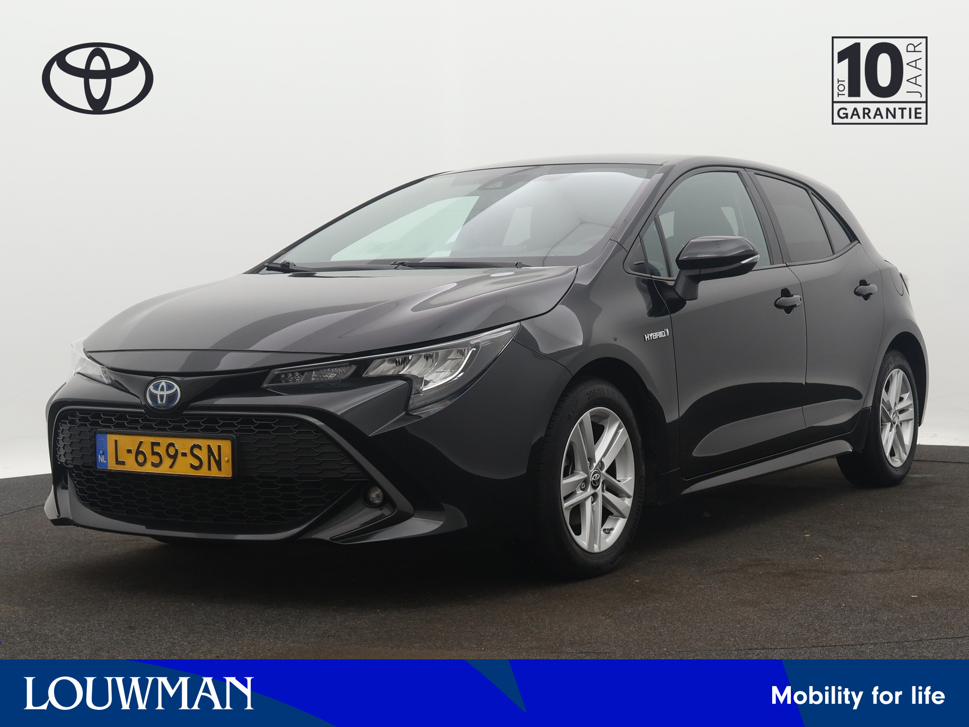 Toyota Corolla 1.8 Hybrid Active | Stoel en stuurwiel verwarmd | Draadloze telefoonlader | LM velgen | Camera | Climate Control | Head-up display |