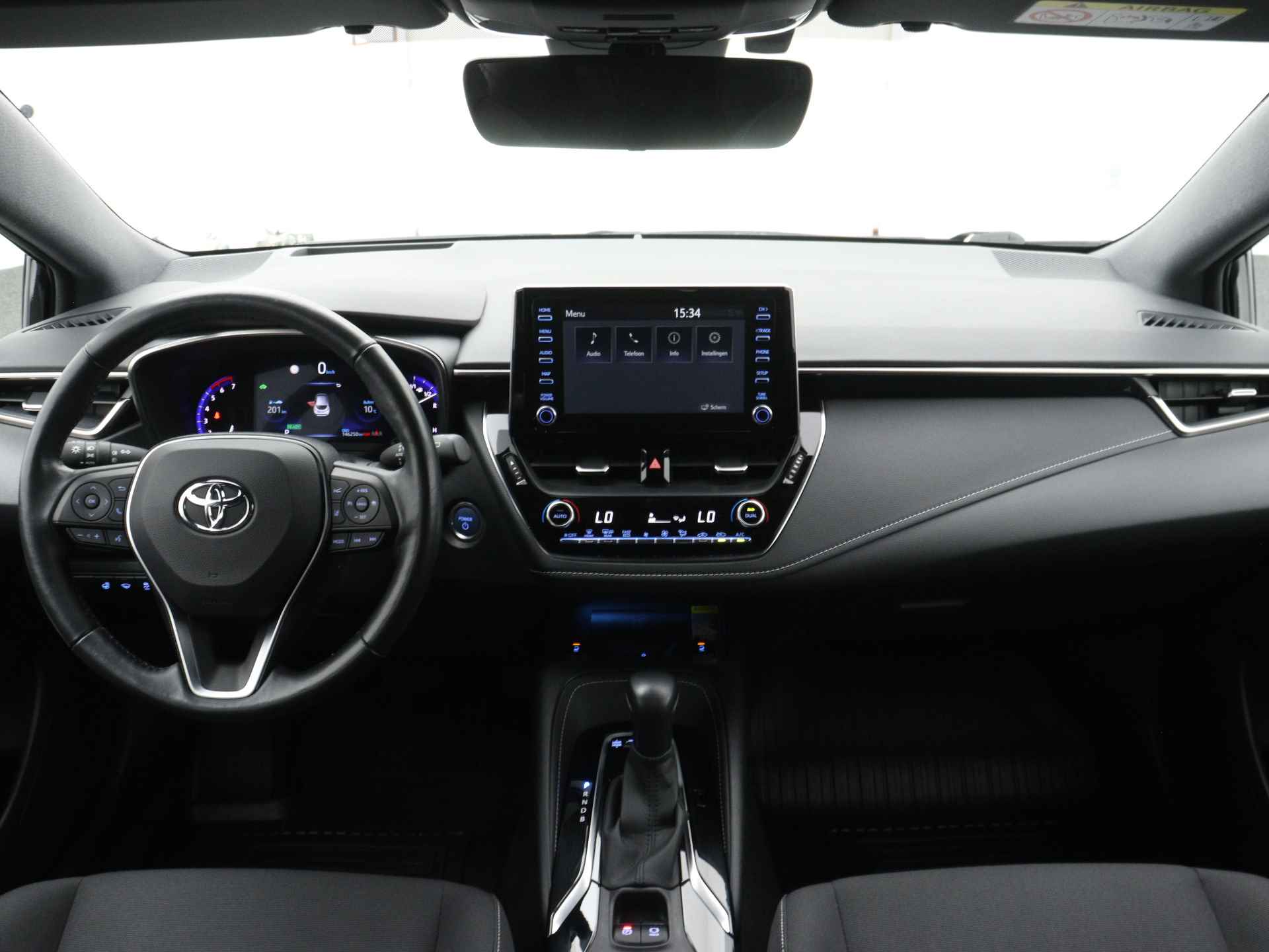 Toyota Corolla 1.8 Hybrid Active | Stoel en stuurwiel verwarmd | Draadloze telefoonlader | LM velgen | Camera | Climate Control | Head-up display | - 6/43