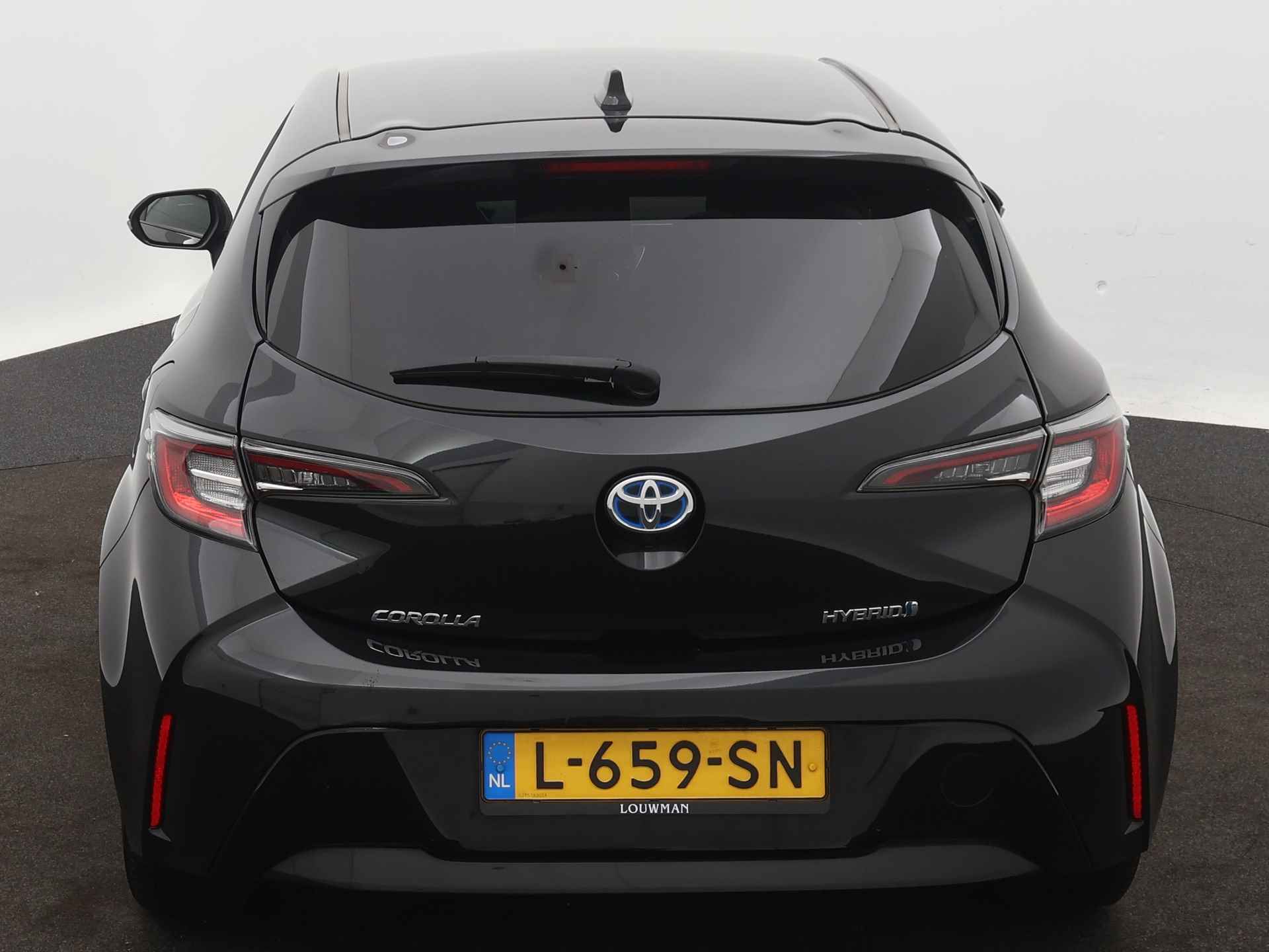 Toyota Corolla 1.8 Hybrid Active | Stoel en stuurwiel verwarmd | Draadloze telefoonlader | LM velgen | Camera | Climate Control | Head-up display | - 30/43