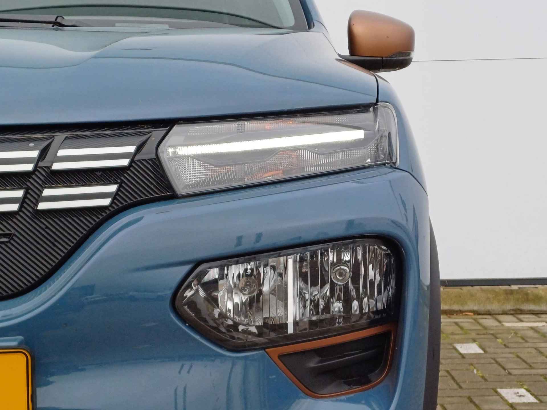 Dacia Spring Extreme 27 kWh | Navigatie | 65pk | State Bleu | - 8/30