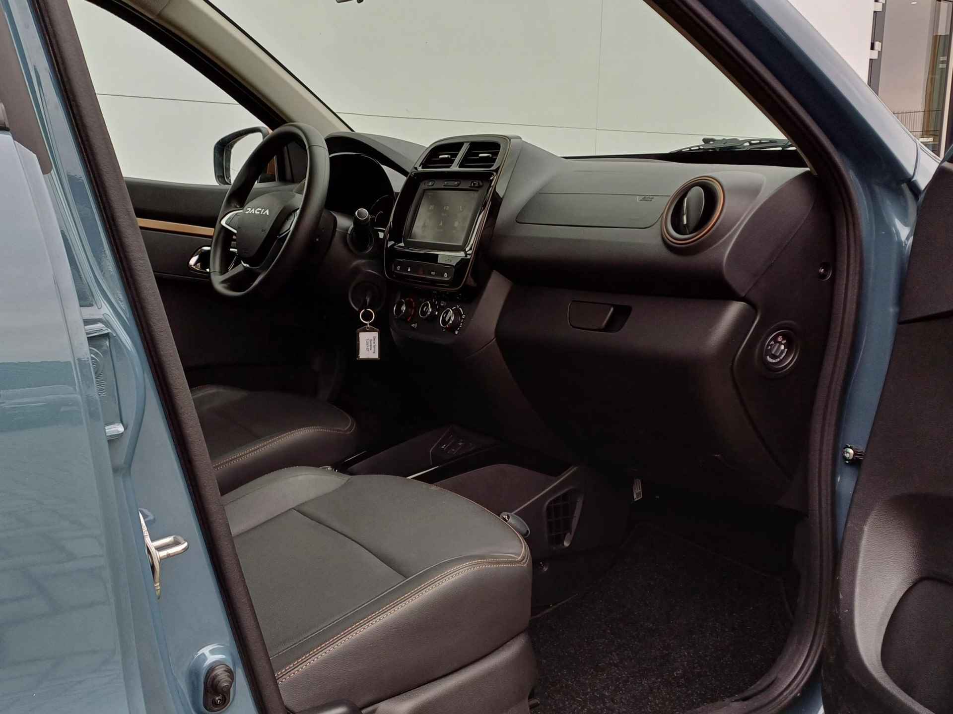 Dacia Spring Extreme 27 kWh | Navigatie | 65pk | State Bleu | - 19/30