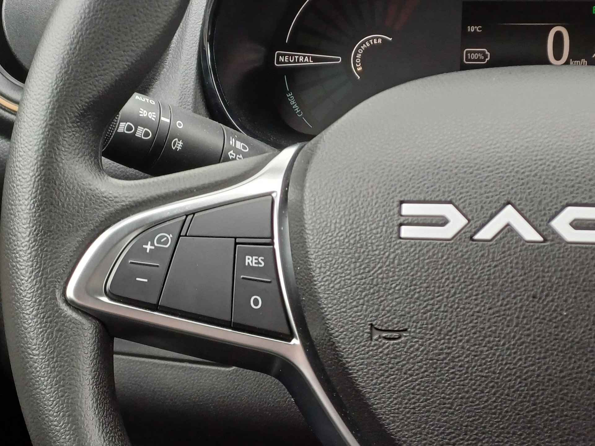Dacia Spring Extreme 27 kWh | Navigatie | 65pk | State Bleu | - 29/30