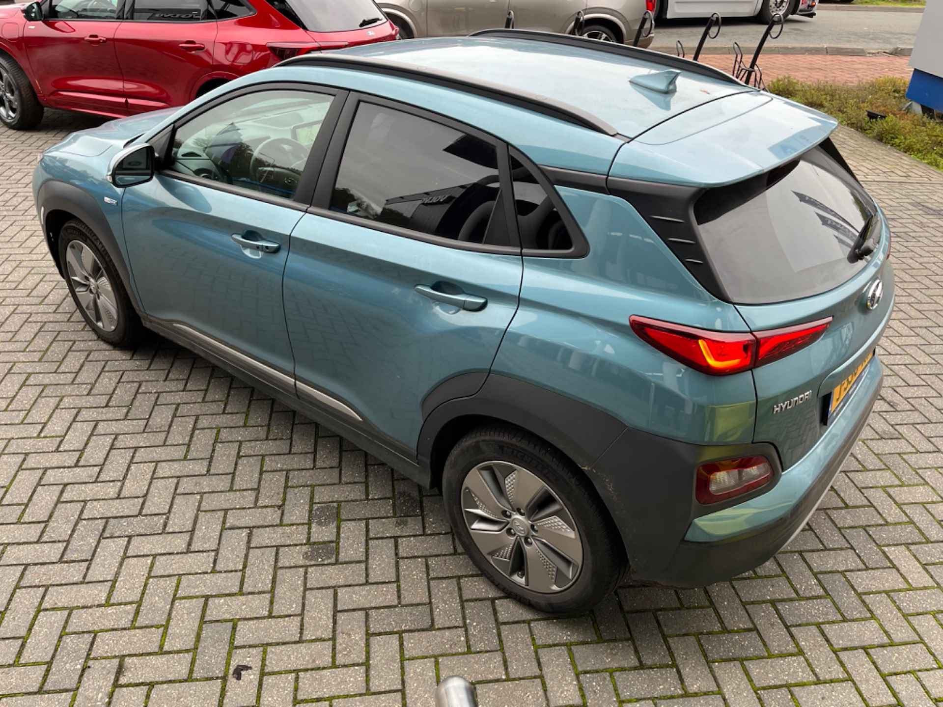 Hyundai KONA EV FASHION 64KWH | NL-AUTO! | CAMERA | KRELL AUDIO | HEAD-UP | BLIS | PRACHTIGE STAAT! - 2/9