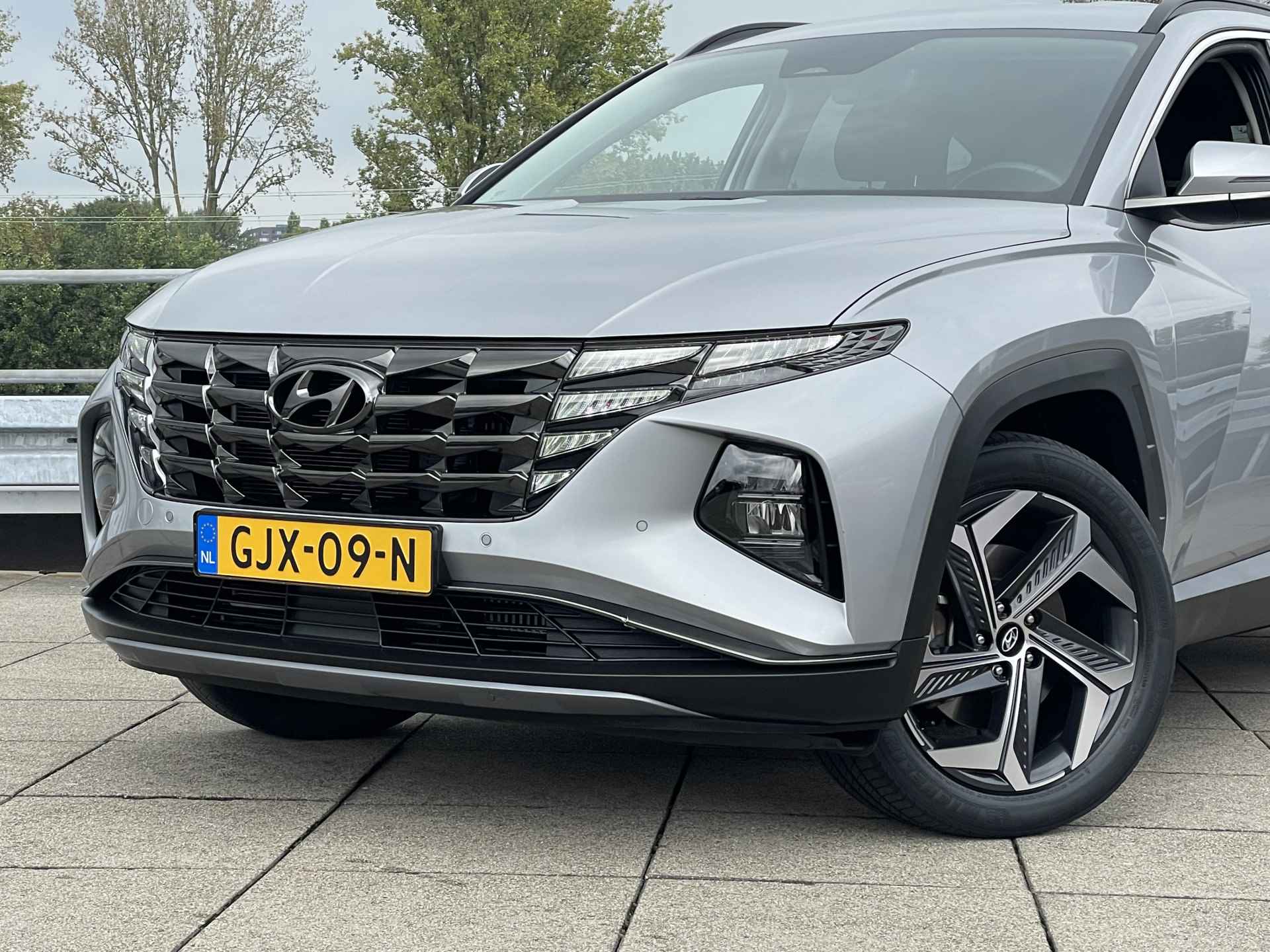 Hyundai Tucson 1.6 T-GDI PHEV Comfort 4WD | Adaptive Cruise Control | Navigatiesysteem | Stoelverwarming | Rijklaarprijs! | - 4/37