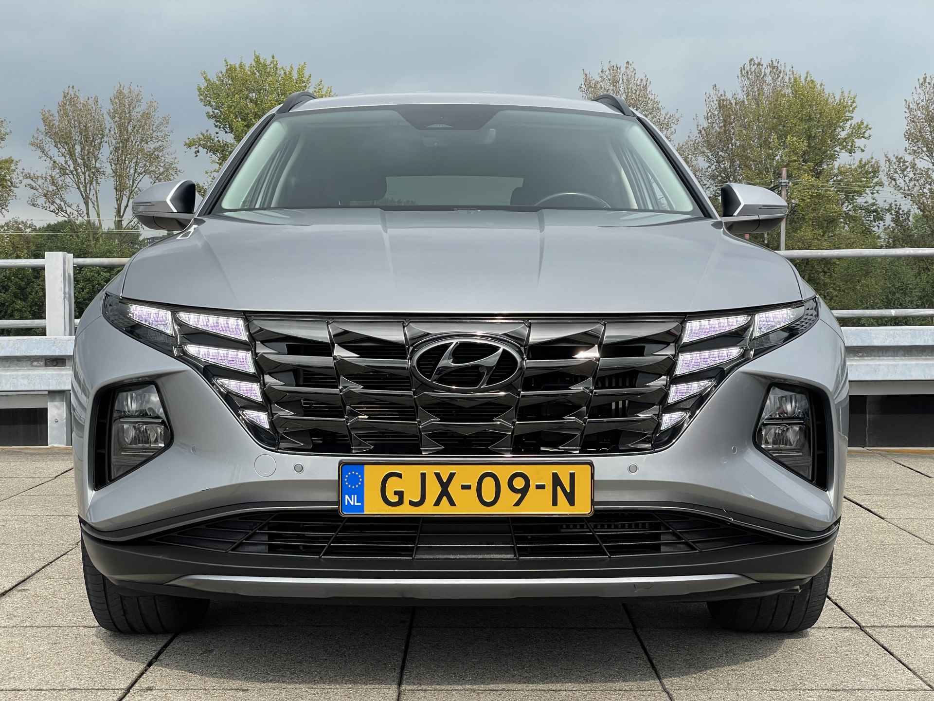 Hyundai Tucson 1.6 T-GDI PHEV Comfort 4WD | Adaptive Cruise Control | Navigatiesysteem | Stoelverwarming | Rijklaarprijs! | - 9/37