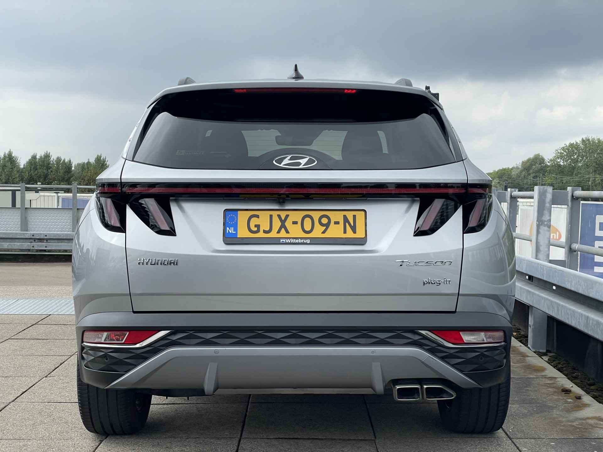 Hyundai Tucson 1.6 T-GDI PHEV Comfort 4WD | Adaptive Cruise Control | Navigatiesysteem | Stoelverwarming | Rijklaarprijs! | - 10/37