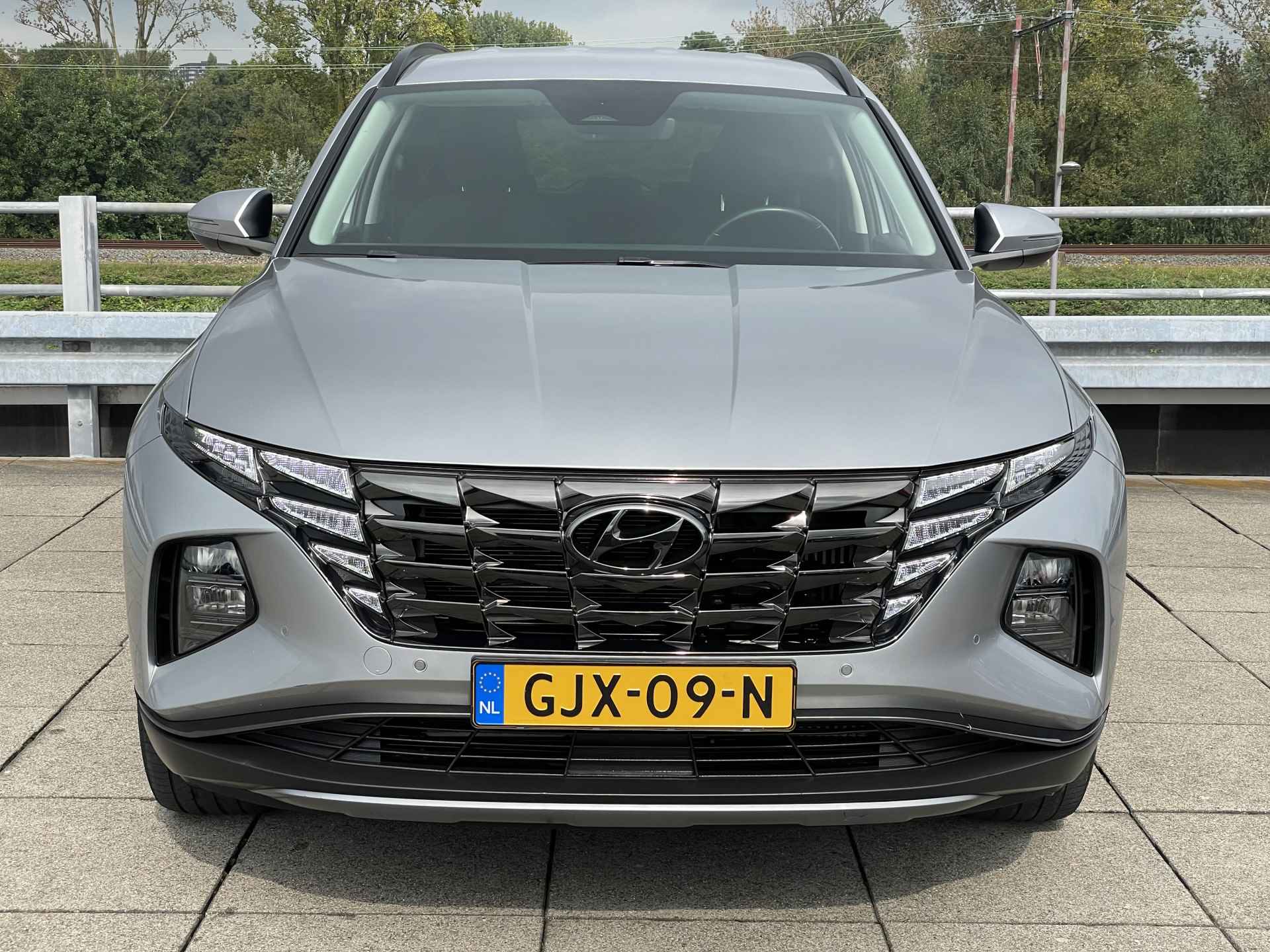 Hyundai Tucson 1.6 T-GDI PHEV Comfort 4WD | Adaptive Cruise Control | Navigatiesysteem | Stoelverwarming | Rijklaarprijs! | - 33/37