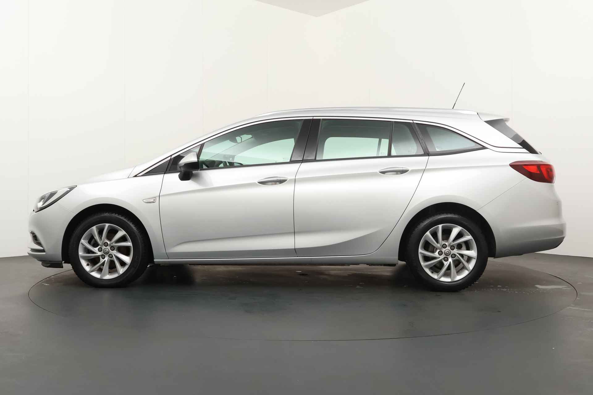 Opel Astra Sports Tourer BWJ 2019 | 1.0 Turbo 105PK Innovation | CLIMA | CAMERA A | CARPLAY | NAVI | EL. KOFFERKLEP | PDC | PRIVACY GLASS | KEYLESS | - 7/31