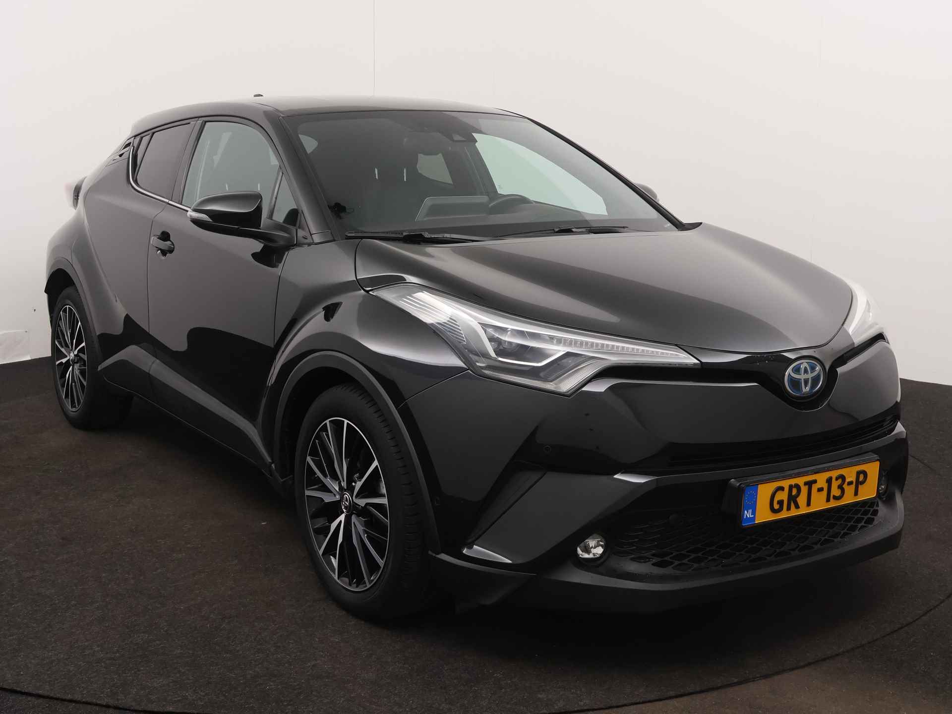 Toyota C-HR 1.8 Hybrid Executive Premium Limited | Navigatie | LM velgen | Parkeersensoren | Stoelverwarming | Cruise Control Adaptief | Climate Control | LED | - 29/45