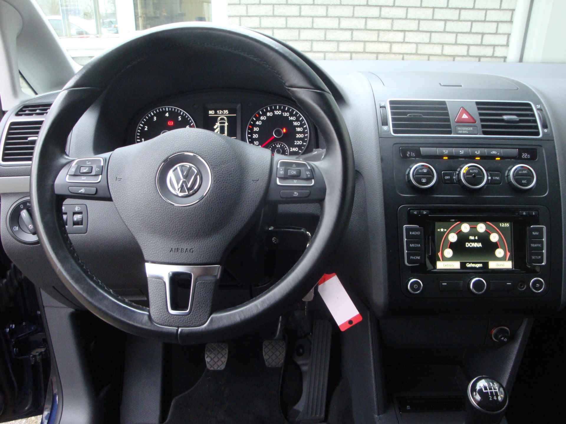 Volkswagen Touran 1.2 TSI Comfortline BlueMotion 7p. / Navigatie - 9/22