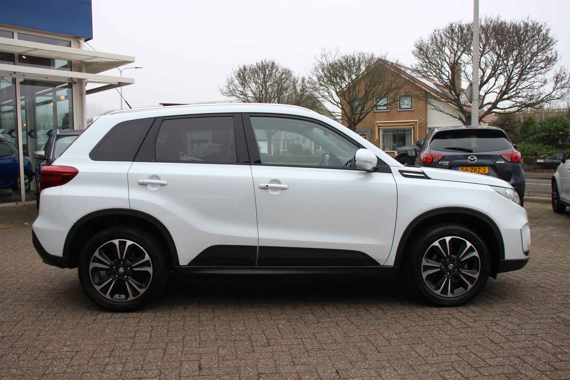 Suzuki Vitara 1.0 Boosterjet Stijl Automaat | Trekhaak | Opendak | PDC | Keyless | - 5/40