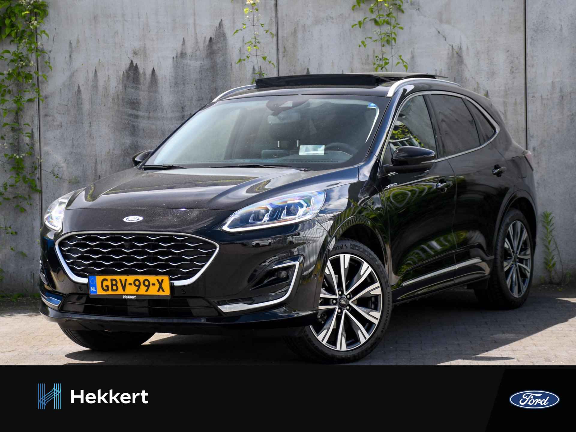 Ford Kuga Vignale 2.5 PHEV 225pk Automaat SCHUIF-DAK | LEDER | WINTER PACK | 20''LM | BLIS | DAB | B&O | NAVI | APPLE-CARPLAY - 1/45