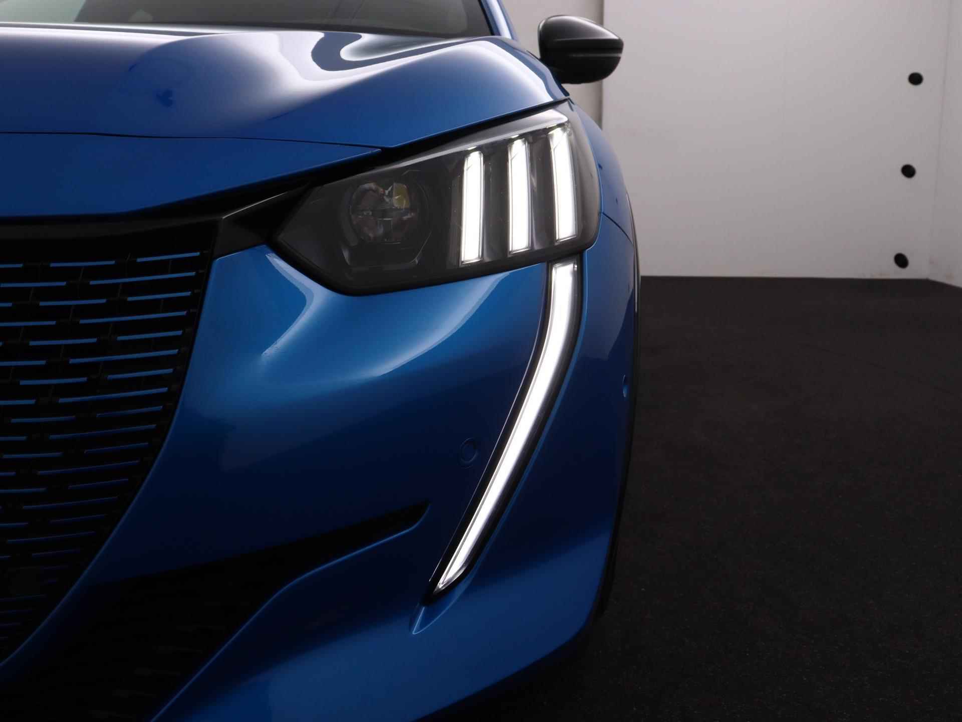 Peugeot e-208 GT 50 kWh 136pk Automaat | Navigatie | 3-fase laden | Panoramadak | Achteruitrijcamera | Stoelverwarming | Full Led koplampen | Leder/Alcantara | Keyless | Climate Control | Adaptieve Cruise Control | Parkeersensoren v+a | 3D Cockpit | Apple Carplay / Android Auto | Dodehoeksensor | 17" lichtmetalen velgen | - 34/41