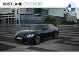 BMW i4 eDrive40 High Executive M Sport 84 kWh / Schuif-kanteldak / Laserlight / M Sportstoelen / Parking Assistant Plus / Harman Kardon / Driving Assistant Professional