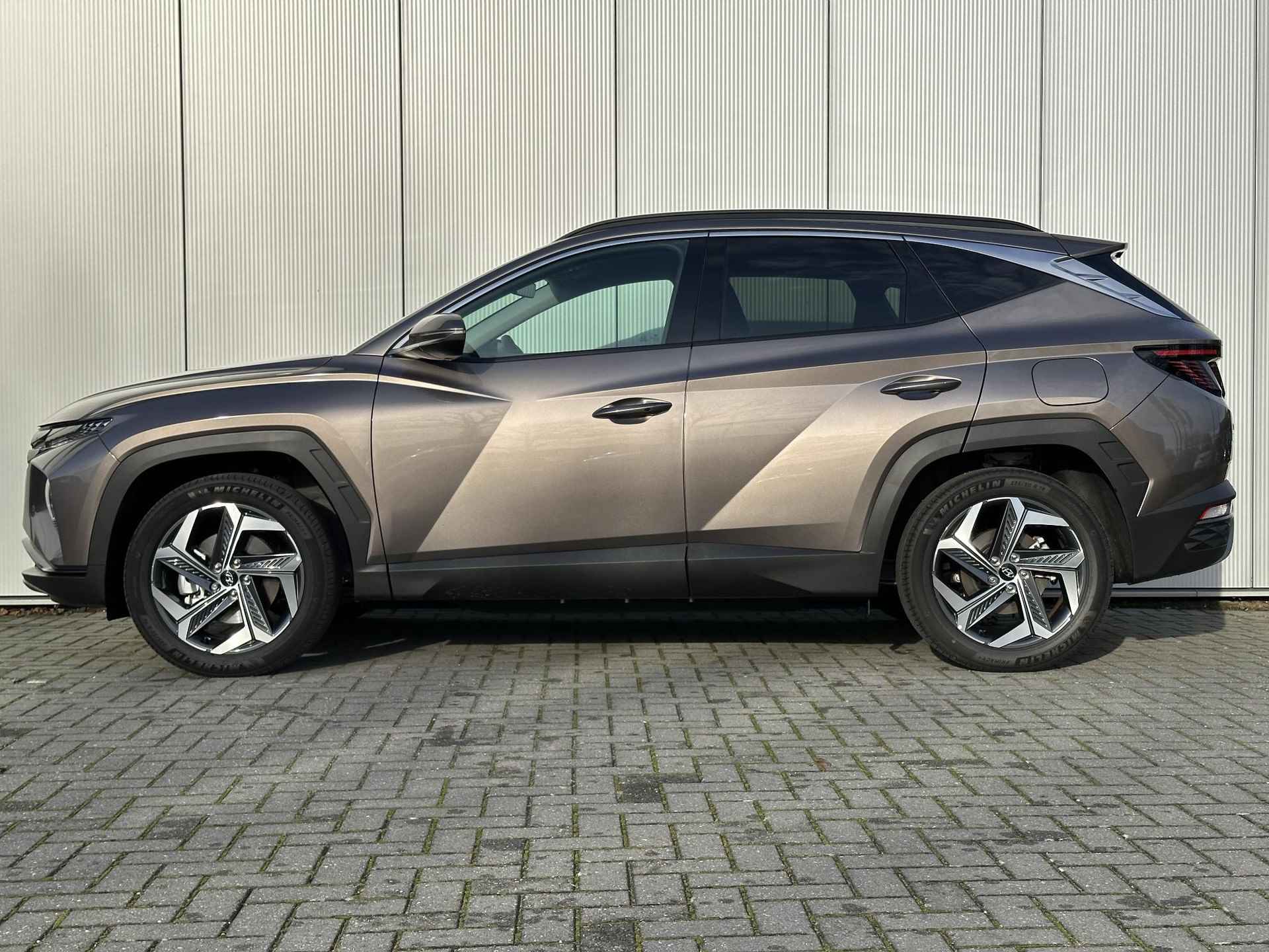 Hyundai Tucson 1.6 T-GDI PHEV Comfort Smart 4WD / Navigatie / Apple Carplay & Android Auto / Achteruitrijcamera / Climate Control / Adaptive Cruise Control / Stoelverwarming / KRELL Audio / Parkeersensoren Voor + Achter / - 6/67