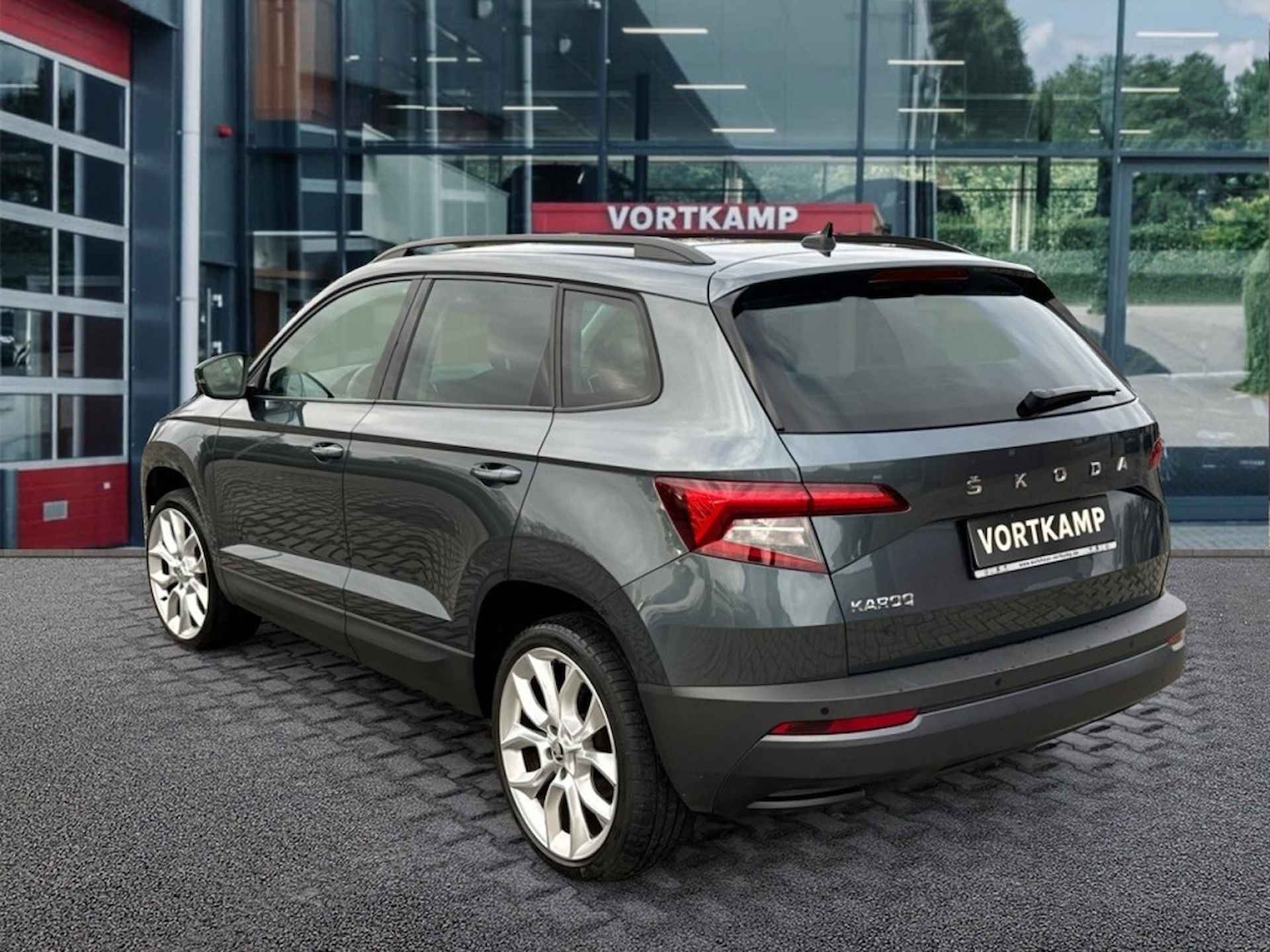 SKODA Karoq 1.5 TSI DSG STYLE PANO-DAK/TREKHAAK/ELEK-STOELEN/CAMERA/CRUISE - 7/28