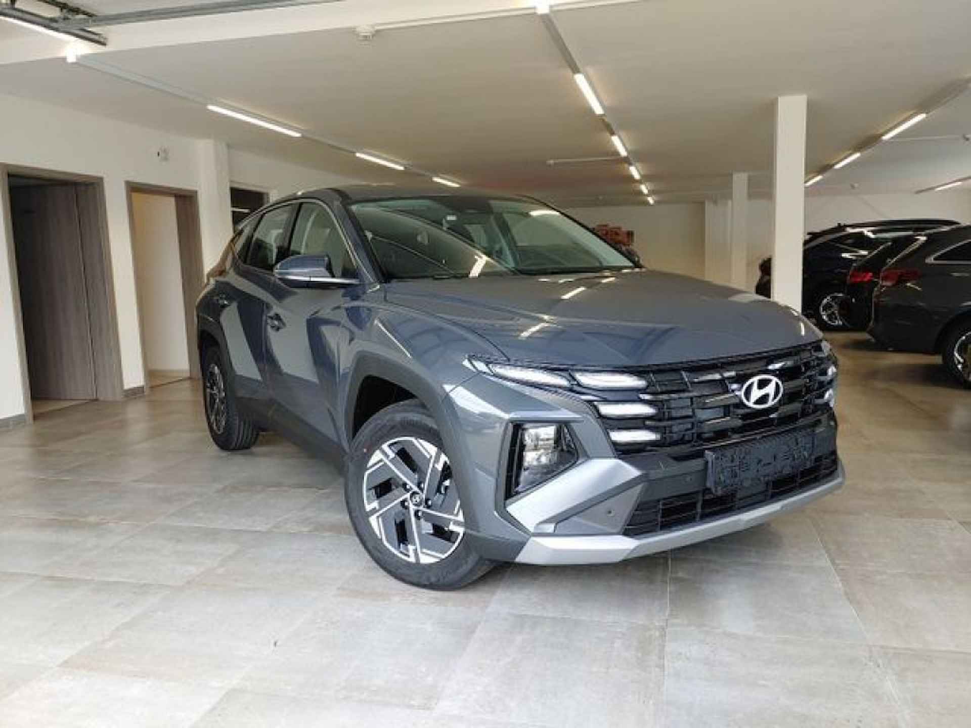 HYUNDAI Tucson 1.6 T-GDI COMFORT CAMERA/NAVI/LED/CARPLAY/STOELVERW - 2/17