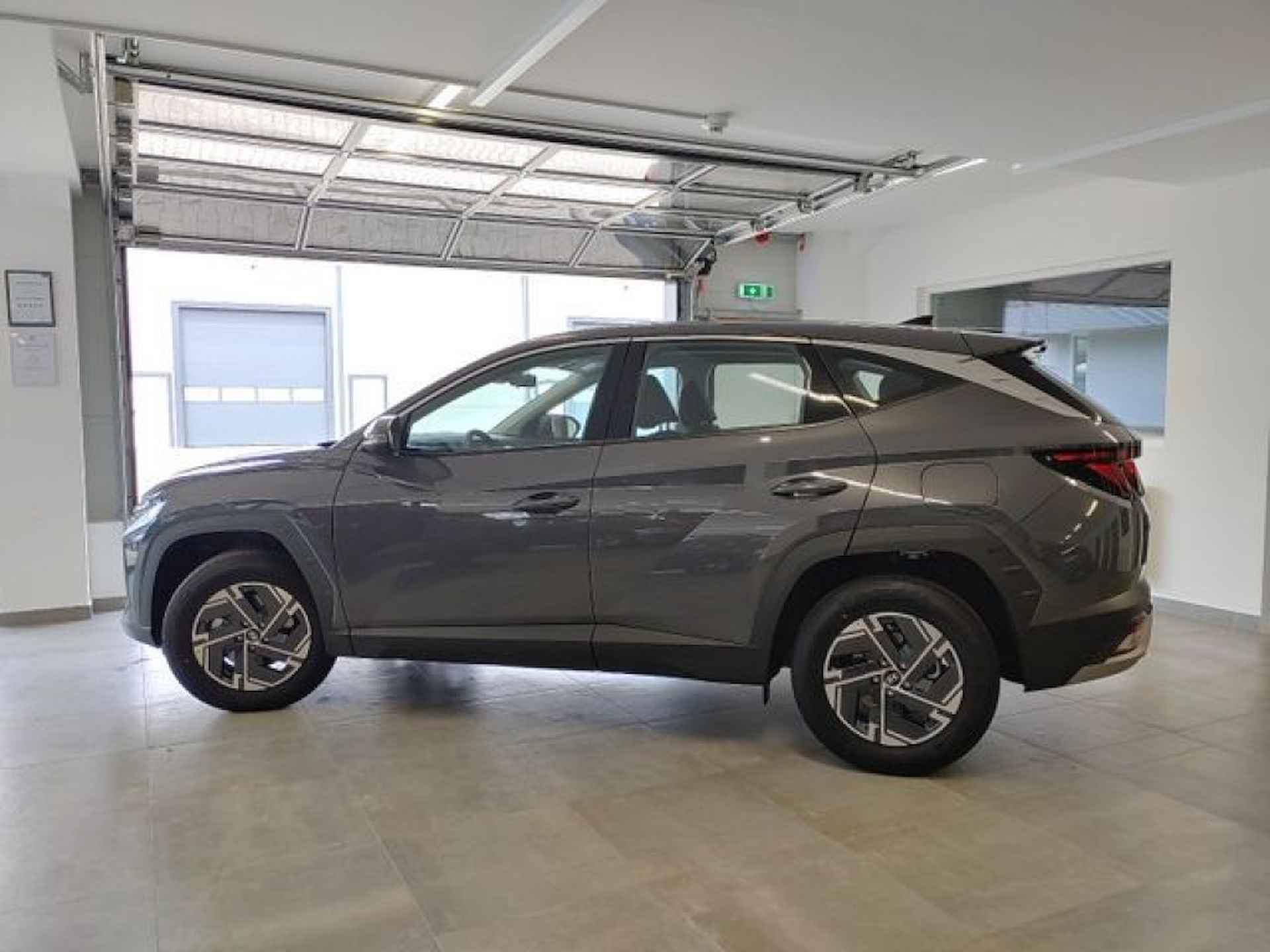 HYUNDAI Tucson 1.6 T-GDI COMFORT CAMERA/NAVI/LED/CARPLAY/STOELVERW - 5/17