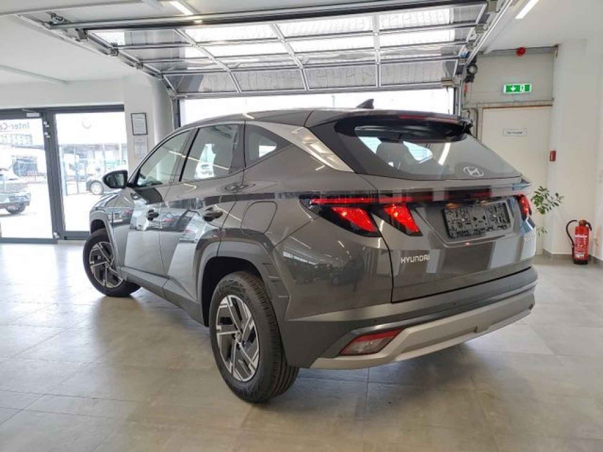 HYUNDAI Tucson 1.6 T-GDI COMFORT CAMERA/NAVI/LED/CARPLAY/STOELVERW - 7/17