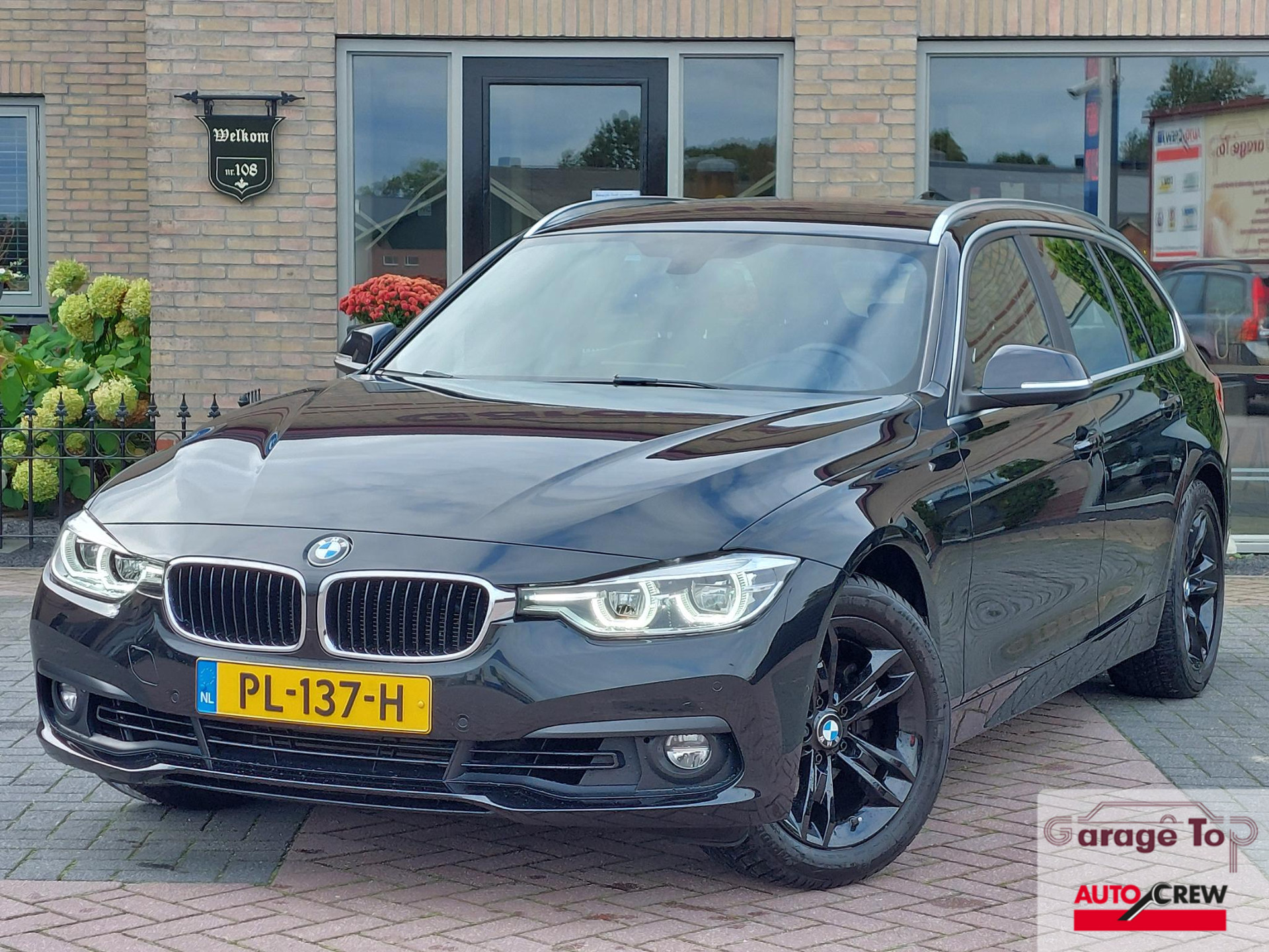 BMW 3-serie Touring 318i High Executive | Leder | Navi | NL auto | Stoelverwarming