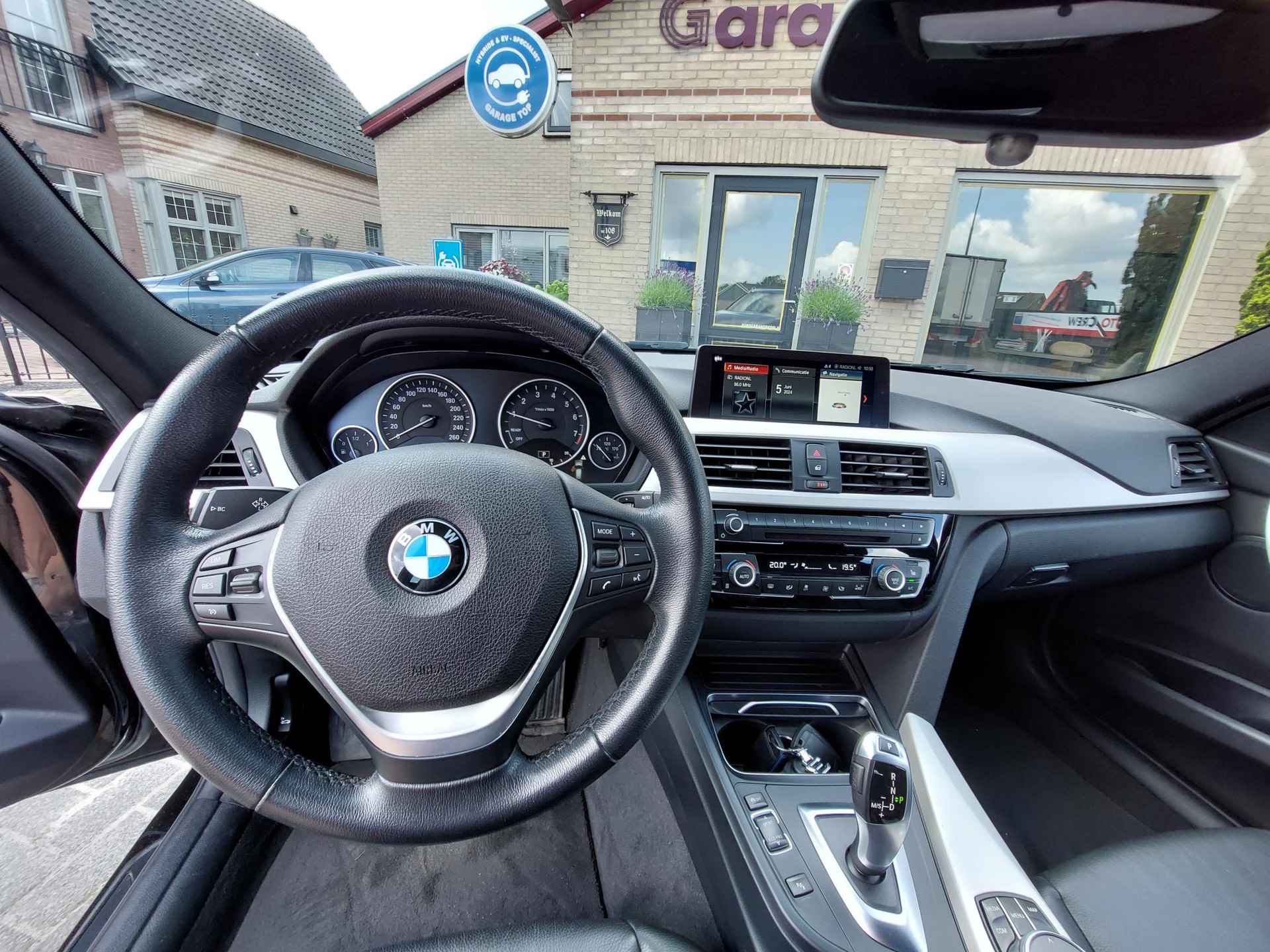 BMW 3-serie Touring 318i High Executive | Leder | Navi | NL auto | Stoelverwarming - 3/43