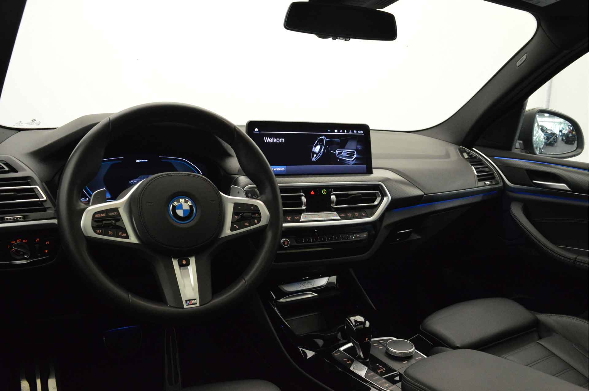 BMW X3 xDrive30e High Executive M Sport Automaat / Panoramadak / Trekhaak / Sportstoelen / Laserlight / Parking Assistant / Head-Up / Stoelverwarming / Live Cockpit Professional - 9/23