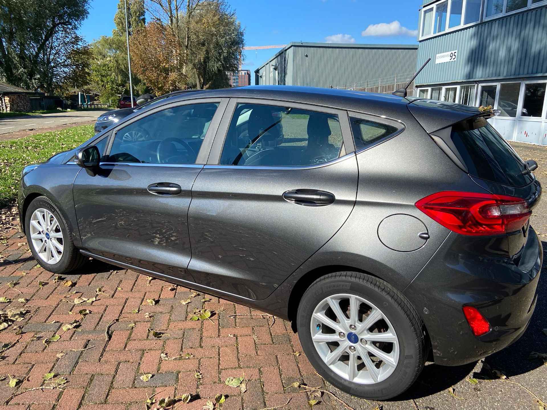 Ford Fiesta 1.5 TDCI TITANIUM | NL-AUTO! | 1E EIGENAAR! | NAVI | CAMERA | CLIMA | VOORRUITVERWARMING | ADAPT. CRUISE | B&O AUDIO | PARK SENS - 4/18