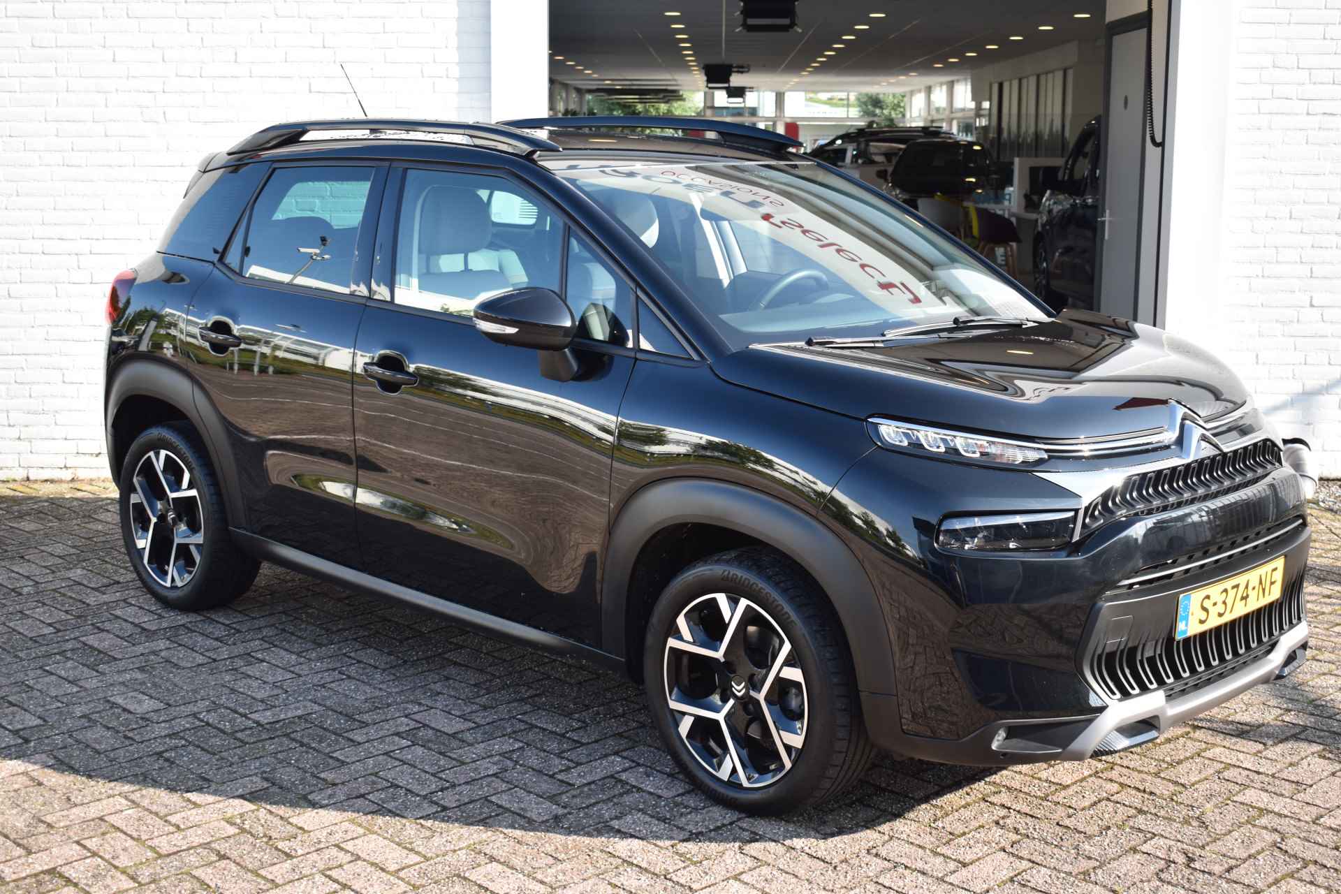 Citroën C3 Aircross PureTech 130 EAT6 Shine Automaat | Navi | Airco | Camera achter | Keyless | Stoelverwarming | 100% onderhouden - 8/27