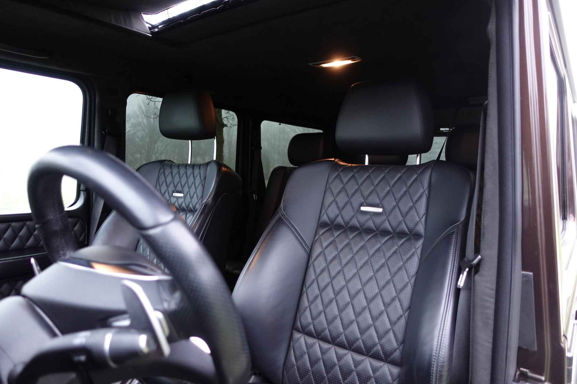 Mercedes-Benz G-Klasse AMG 63 V8 | Brabus pakket | Cruise control | Panoramadak | AMG Stoelen | Standkachel | Schuifdak | H&K | Camera | - 58/69