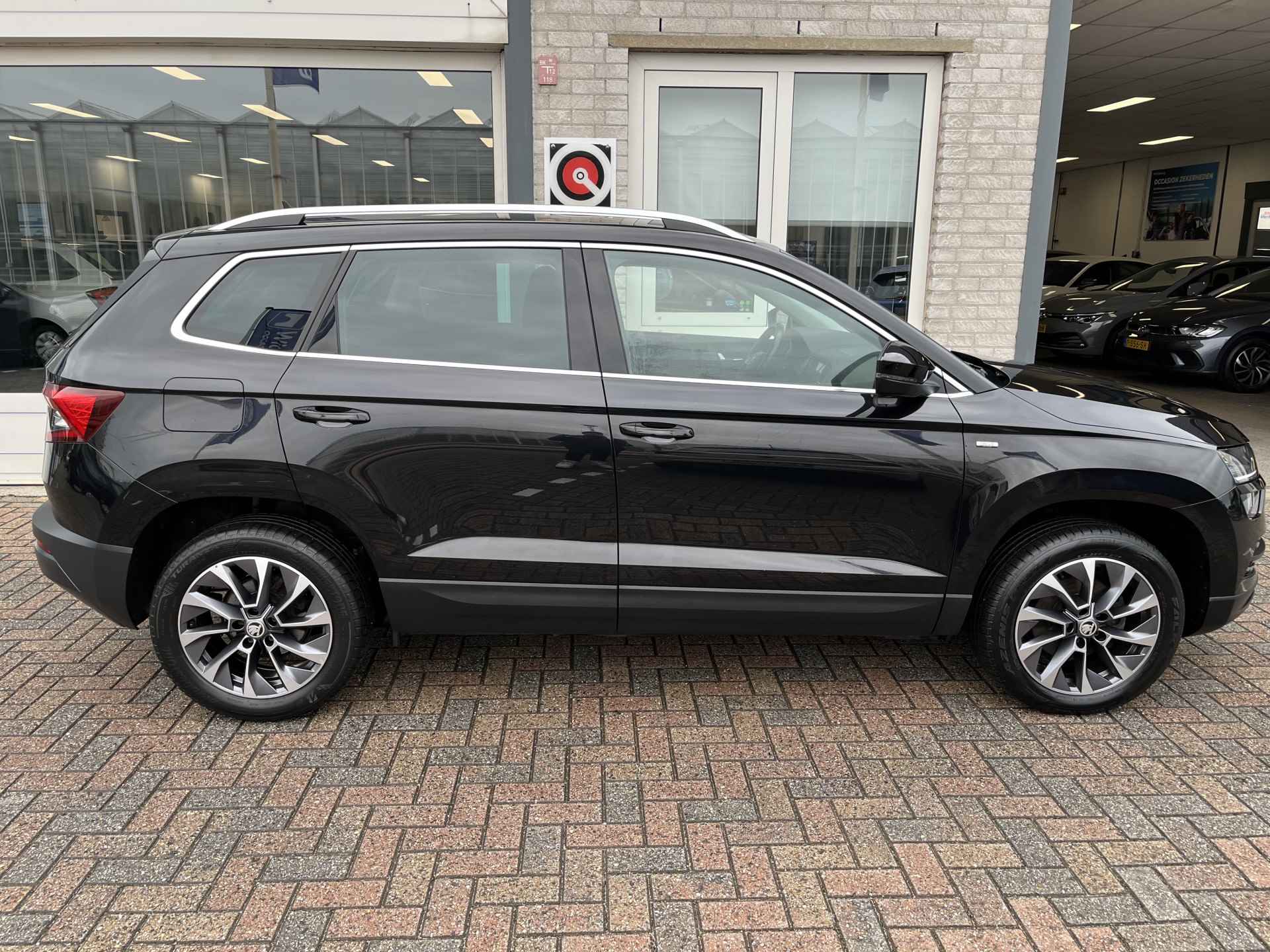 Škoda Karoq 1.0 TSI Ambition Drive 125 / PARK. SENSOREN/ CRUISE/ STOEL VERWARM. V EN A/ KEYLESS/ APP CONNECT/ CLIMA/ DAB/ - 39/43