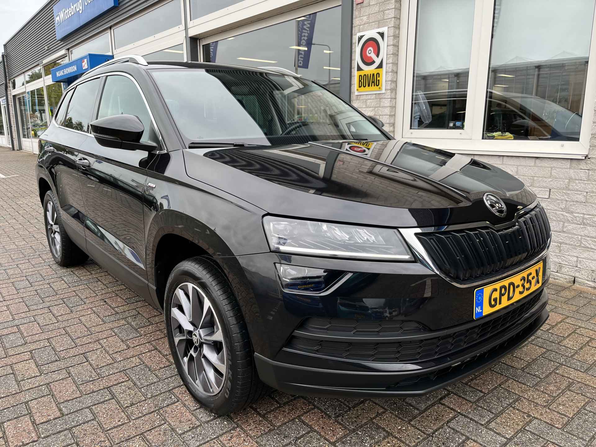 Škoda Karoq 1.0 TSI Ambition Drive 125 / PARK. SENSOREN/ CRUISE/ STOEL VERWARM. V EN A/ KEYLESS/ APP CONNECT/ CLIMA/ DAB/ - 40/43