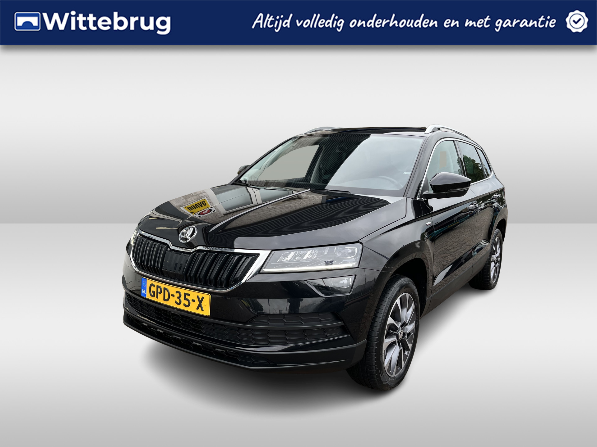 Škoda Karoq 1.0 TSI Ambition Drive 125 / PARK. SENSOREN/ CRUISE/ STOEL VERWARM. V EN A/ KEYLESS/ APP CONNECT/ CLIMA/ DAB/