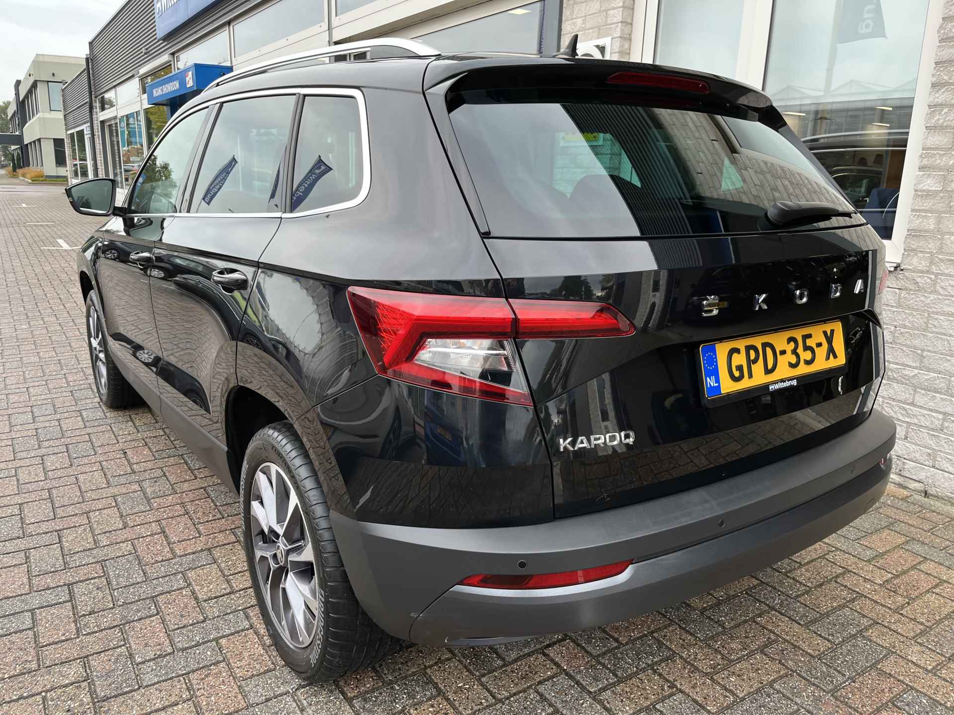 Škoda Karoq 1.0 TSI Ambition Drive 125 / PARK. SENSOREN/ CRUISE/ STOEL VERWARM. V EN A/ KEYLESS/ APP CONNECT/ CLIMA/ DAB/ - 6/43