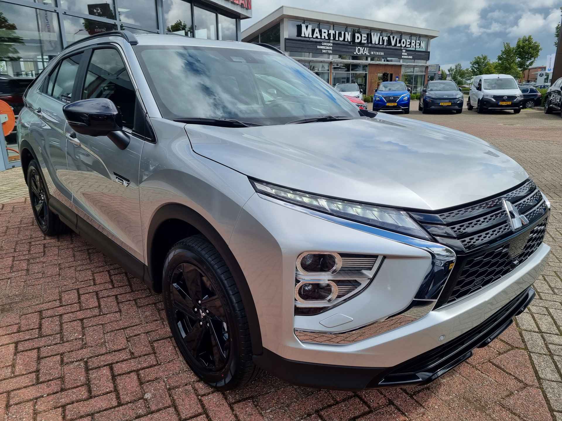 Mitsubishi Eclipse Cross 2.4 PHEV Black Edition Van € 47.380,- voor € 39.430,- - 2/39