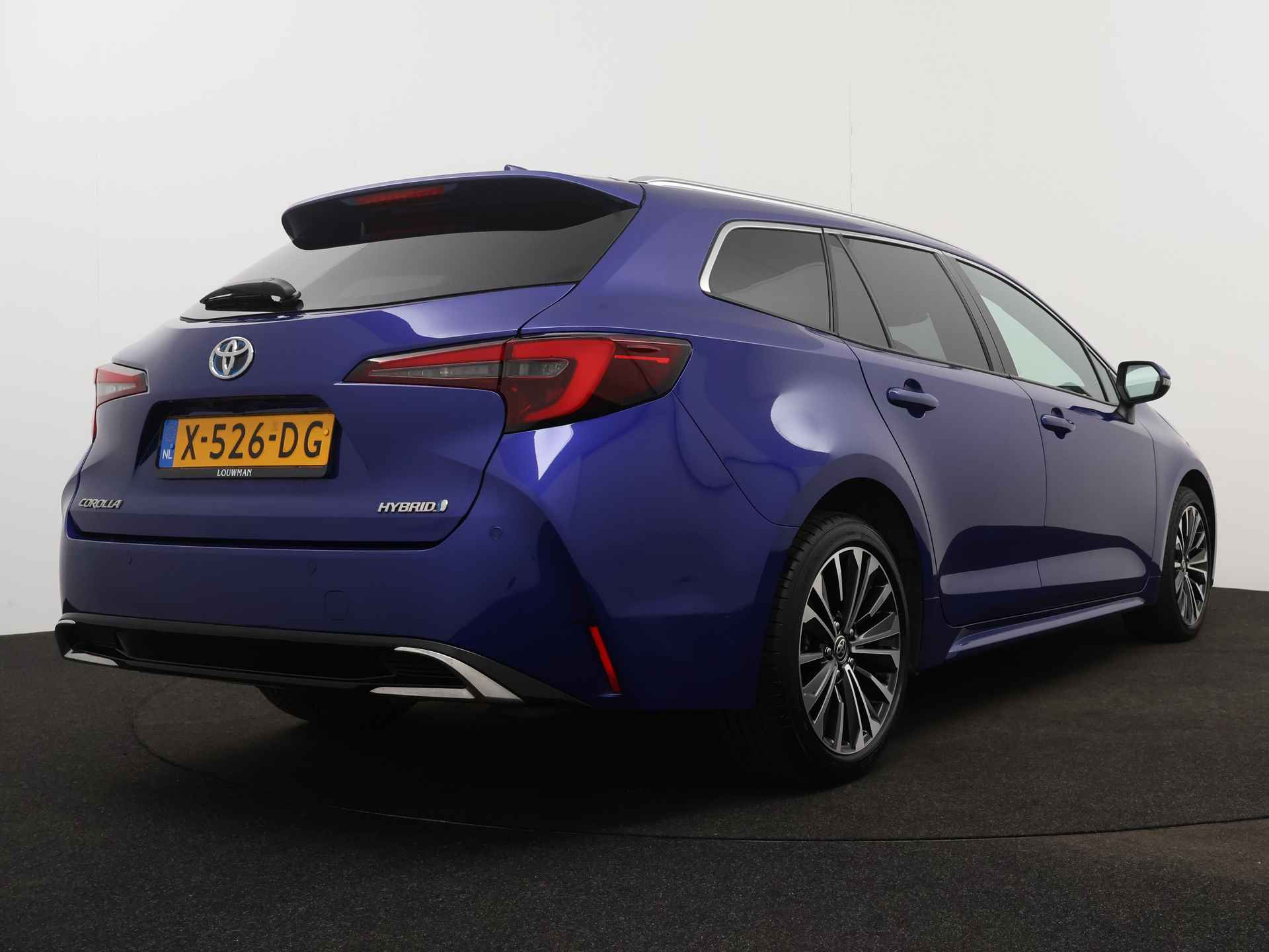 Toyota Corolla Touring Sports 1.8 Hybrid First Edition | Parkeersensoren | Navigatie | Climate Control | Stoelverwarming | - 3/46