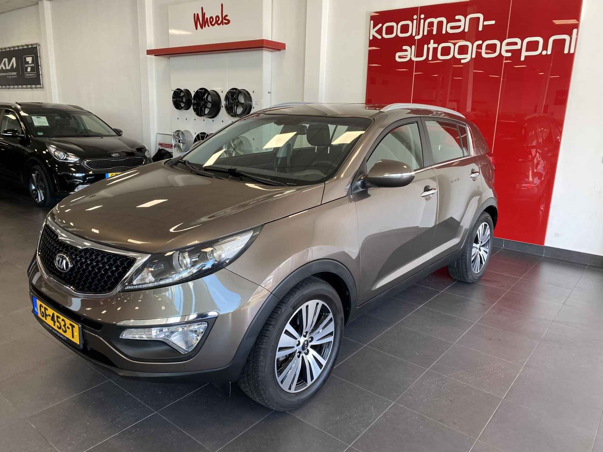 Kia Sportage 1.6 GDI DynamicLine | Audio-navigatie full map | Achteruitrij camera | Elektr. climate control | Cruise control | LM Velgen | Parkeersensoren achter | Start/Stop systeem | - 18/25