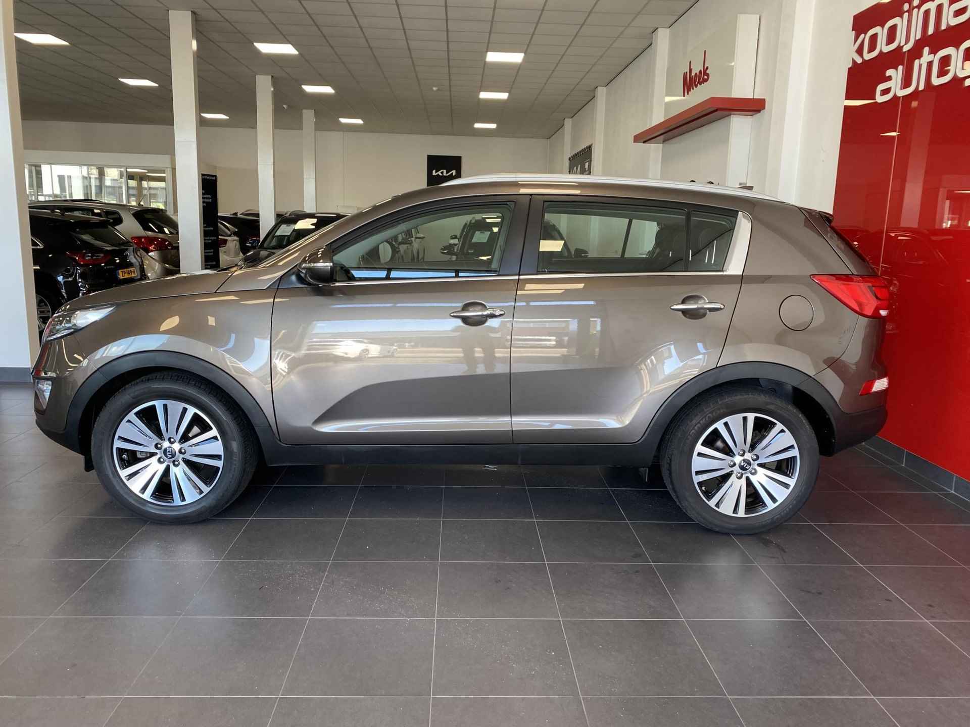 Kia Sportage 1.6 GDI DynamicLine | Audio-navigatie full map | Achteruitrij camera | Elektr. climate control | Cruise control | LM Velgen | Parkeersensoren achter | Start/Stop systeem | - 21/25