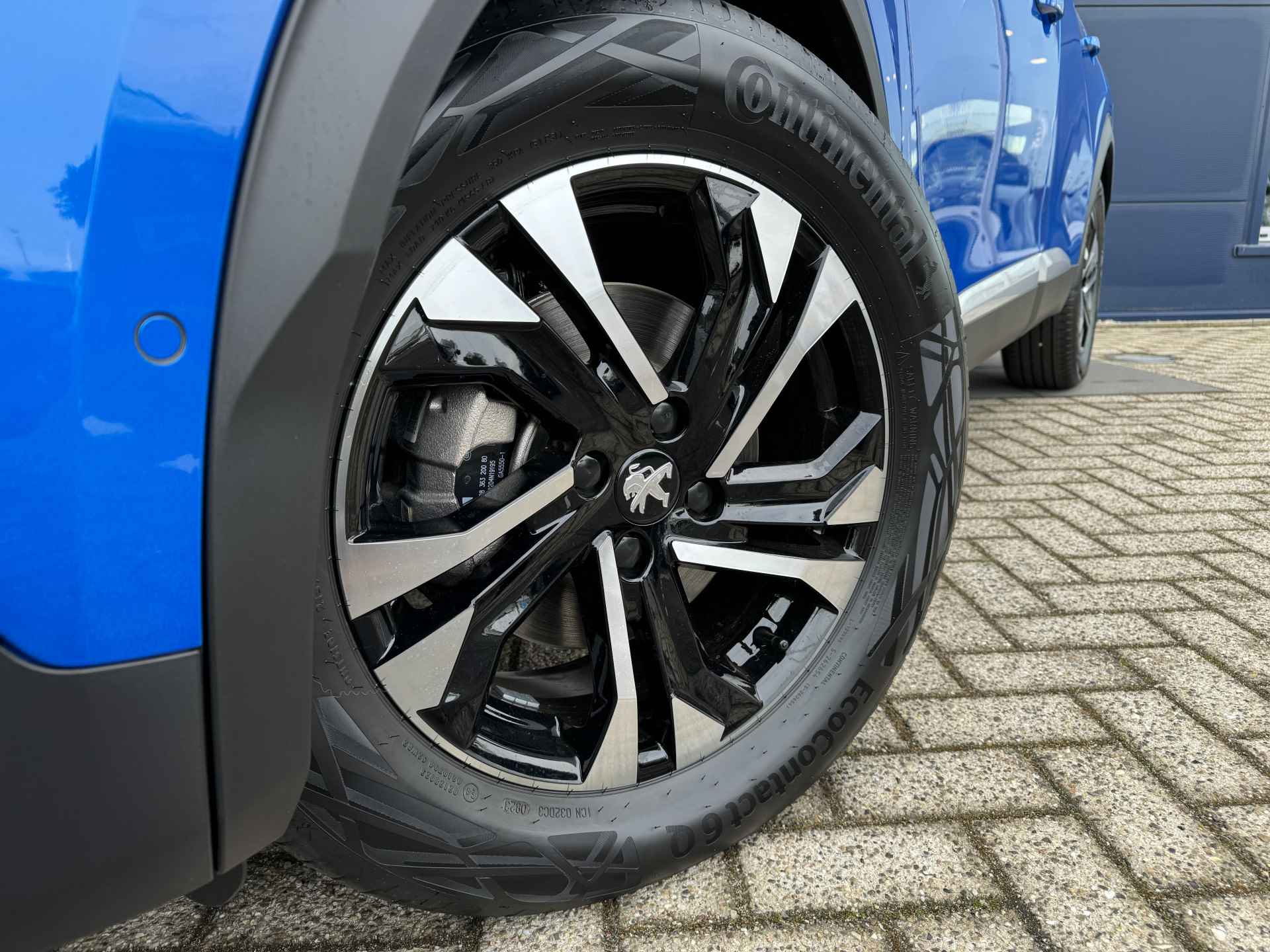 Peugeot e-2008 EV GT 50 kWh | Schuif/Kantel dak | Stoelverwarming | Achteruitrij camera | Sensoren V/A | Keyless - 7/45