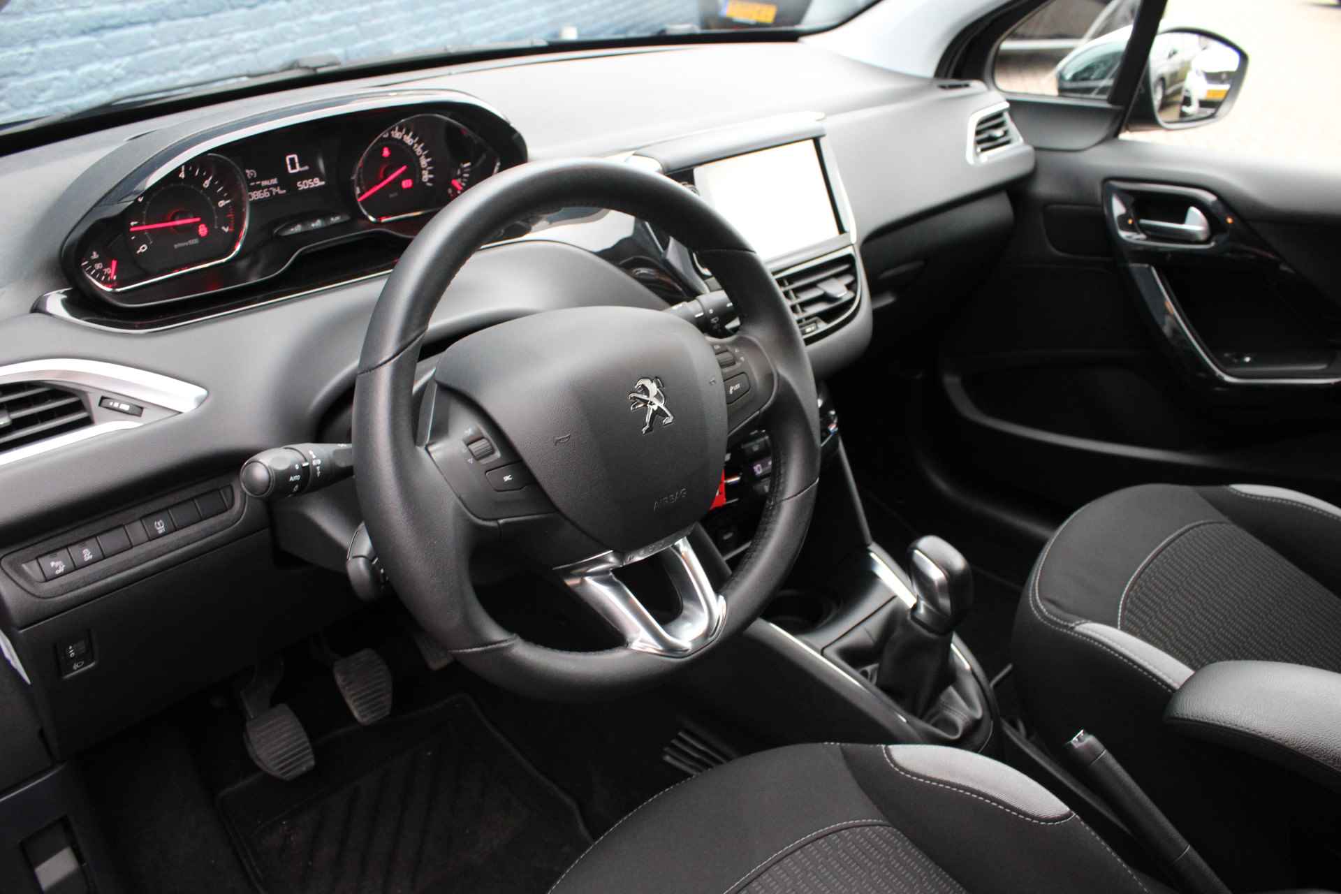 Peugeot 208 5drs 1.2 PureTech Style Pack | Navigatie | Climate control | Lichtmetaal | 1e Eigenaar | - 18/29