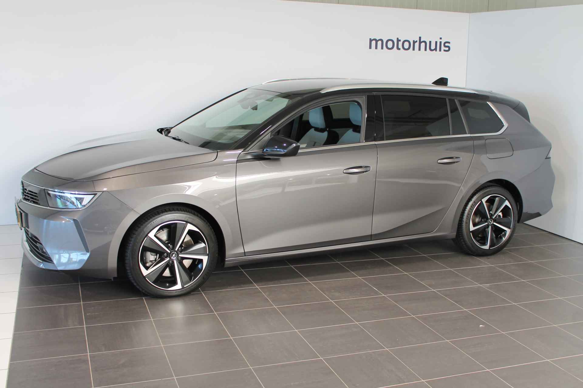 Opel Astra Sports Tourer 1.6 T PHEV 180PK Aut ELEGANCE NAVI LED CAMERA WINTERPACK - 3/29