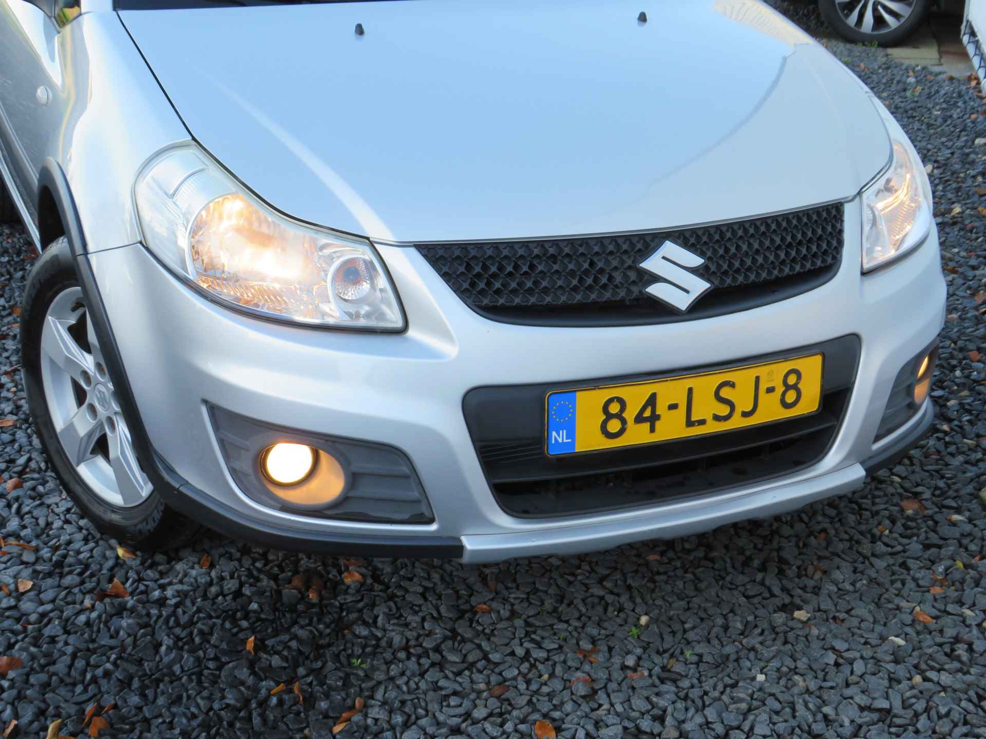 Suzuki SX4 1.6 Exclusive, Trekhaak, parkeersensoren, 2e Eig. Keyless en Middenarmsteun - 27/31