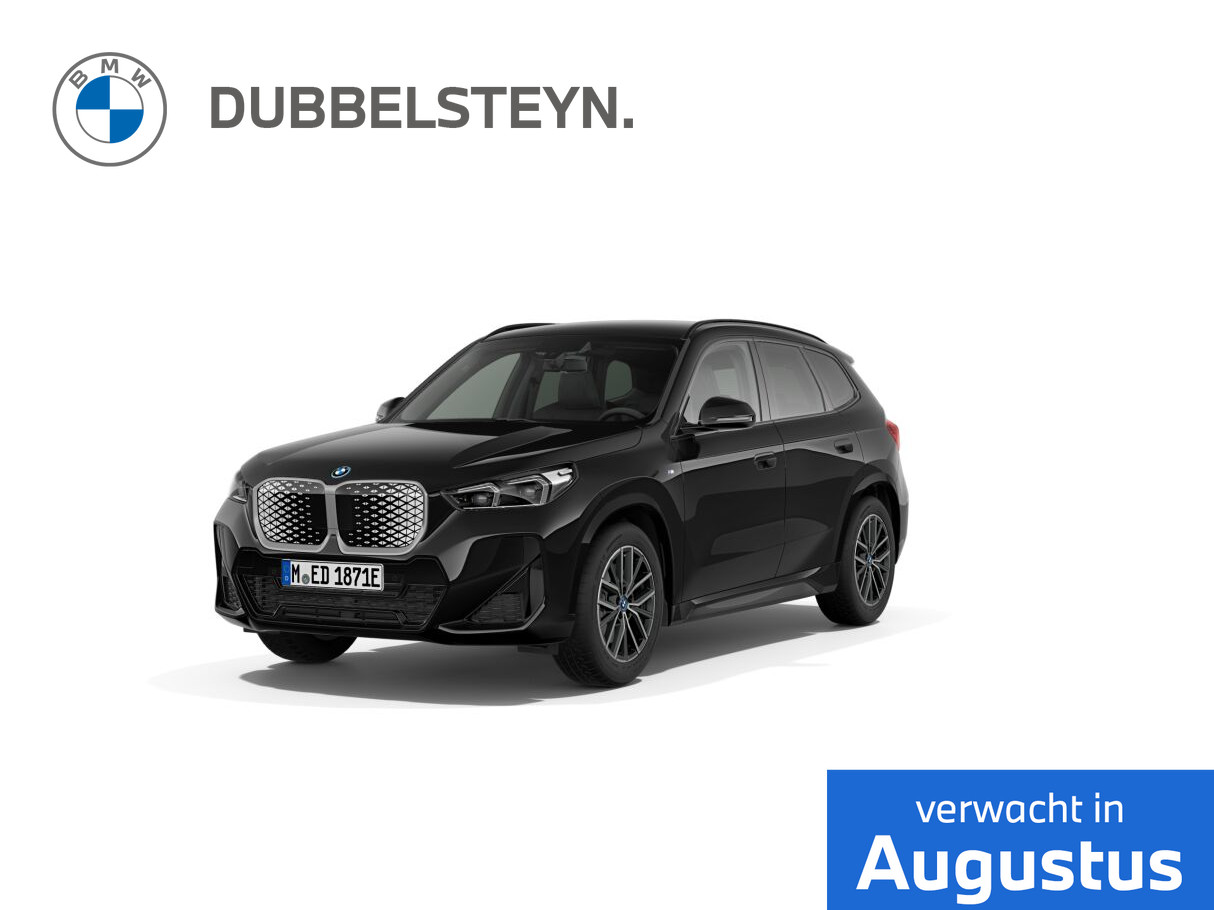BMW iX1 eDrive20 67 kWh M Sportpakket | Premium Pack | Trekhaak met elektrisch wegklapbare kogel | Dakdraagsysteem M hoogglans Shadow Li bij viaBOVAG.nl
